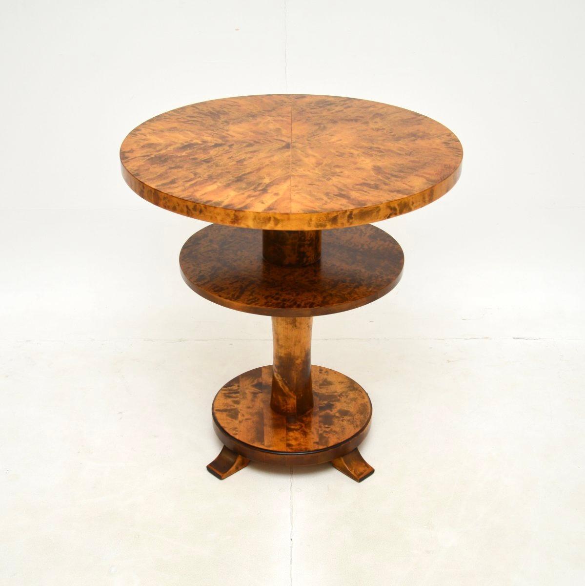 An absolutely stunning Swedish Art Deco satin birch occasional table. This was recently imported from Sweden, it dates from the 1930’s.

The quality is outstanding, this has a beautiful and useful design. The circular top and circular lower tier