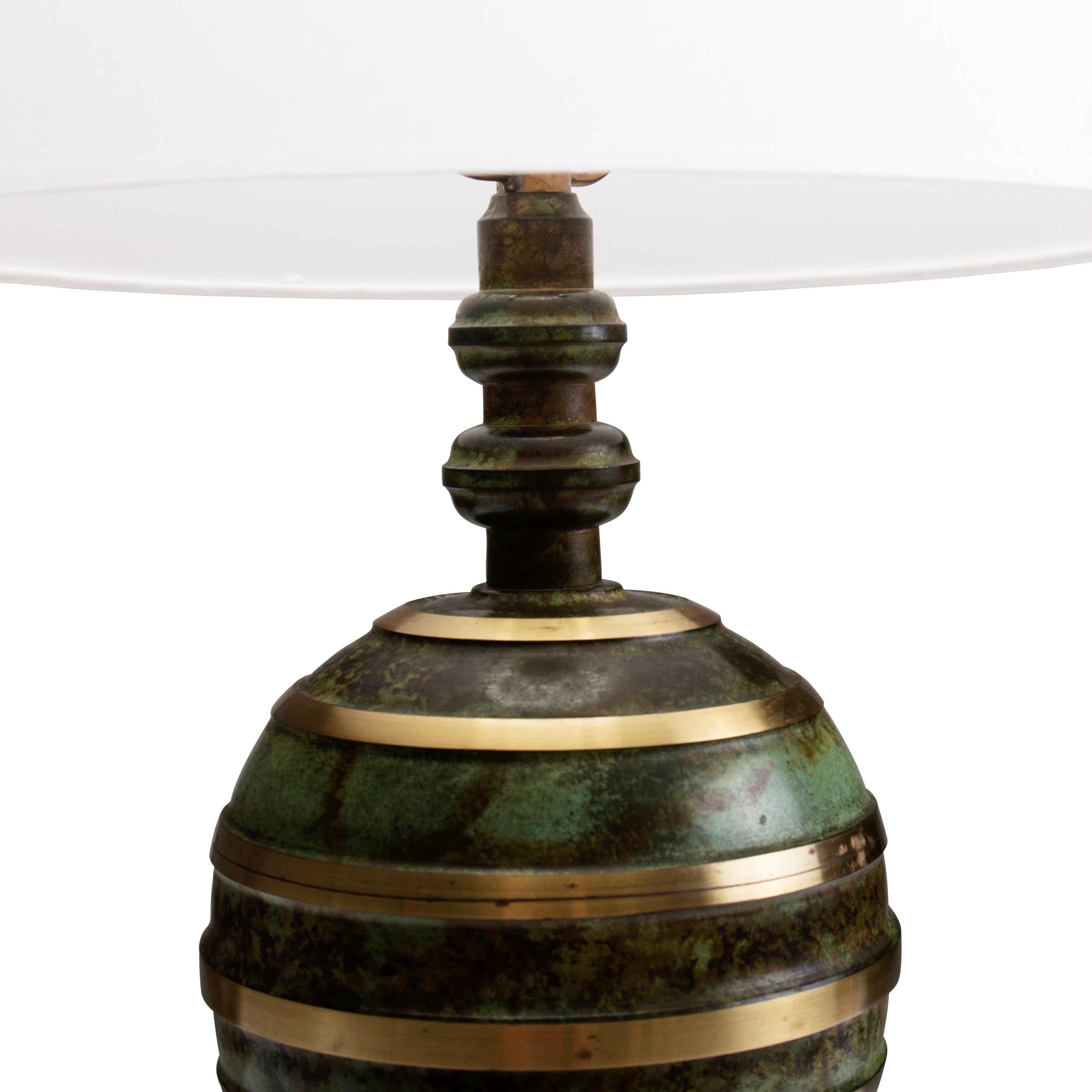 Bronze Swedish art deco table lamp with patinated and polished bronze For Sale