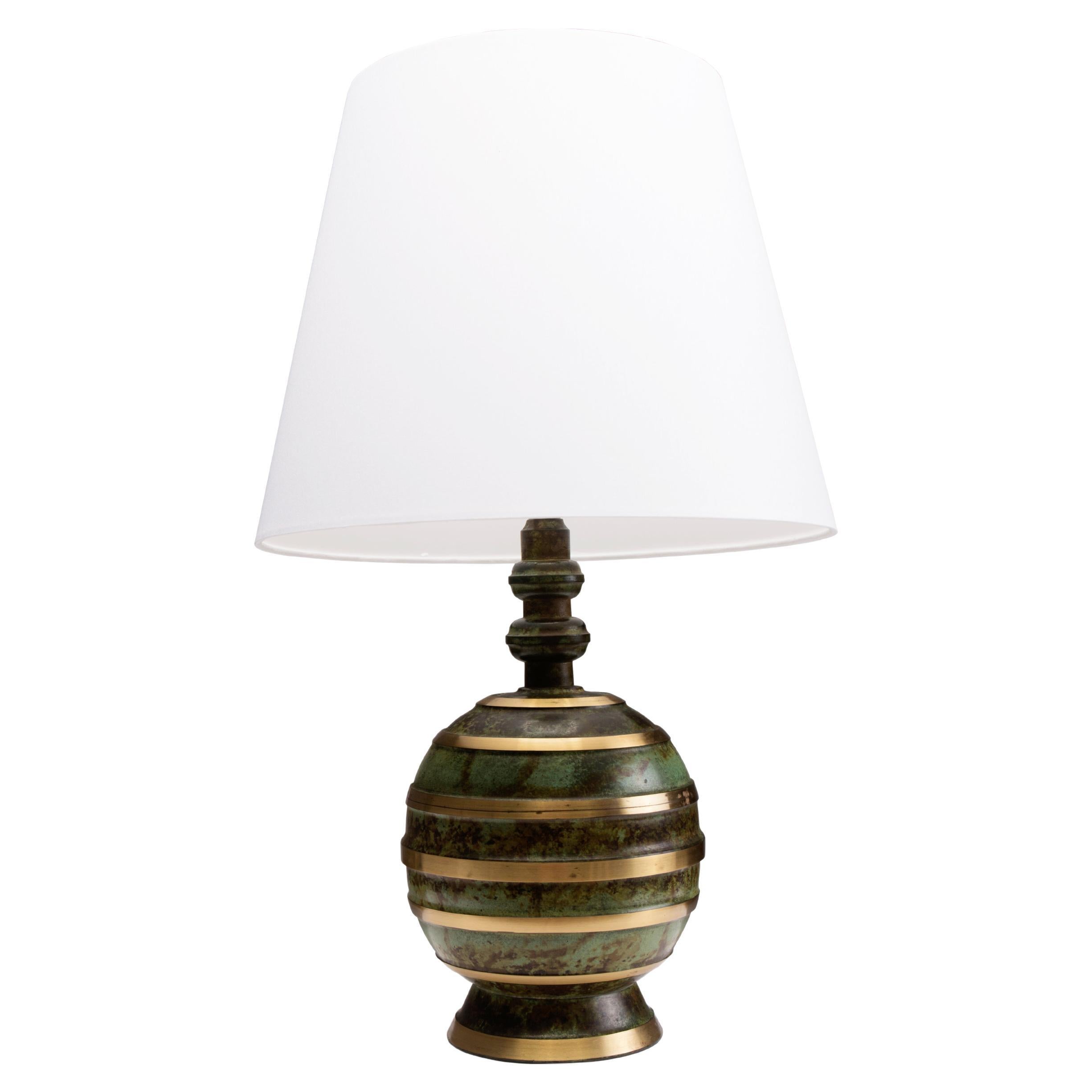 Swedish art deco table lamp with patinated and polished bronze For Sale