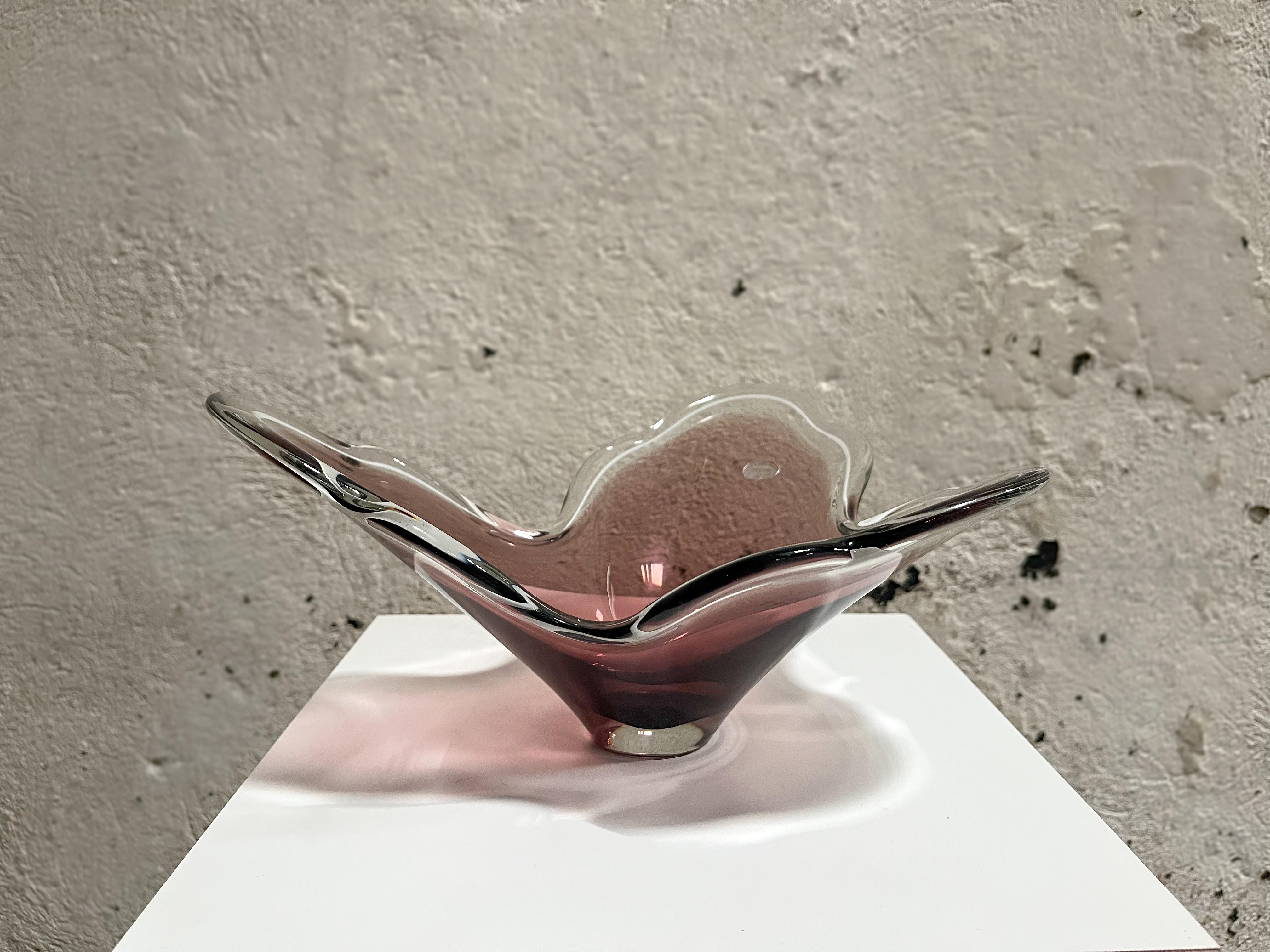 Biomorphic freeform leaf-like ruffled edge lead crystal cased bowl by FA. W. Johansson for Orrefors glassworks.  Dusty with a brownish-pinkish cast - cased in clear crystal<br />
<br />
Engraved 