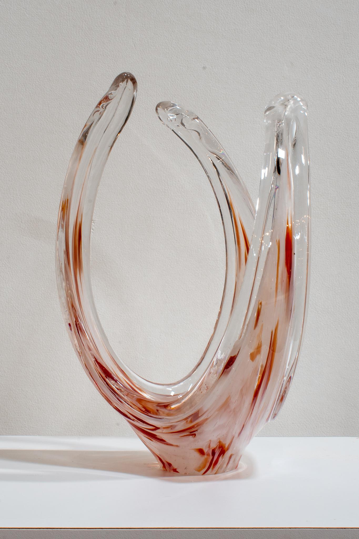 Freeform vase with shallow bowl in heavy lead glass crystal. Deep rust-red accents. Unfortunately no signature on base.