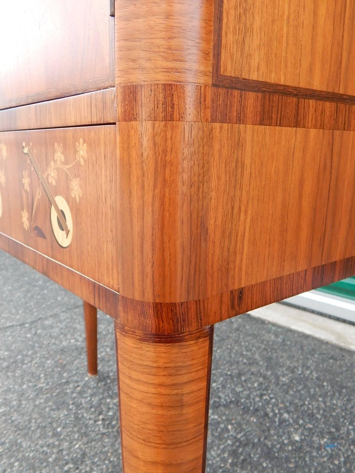 Mid-20th Century Swedish Art Moderne Storage Cabinet with Inlaid Musical Instruments, circa 1940