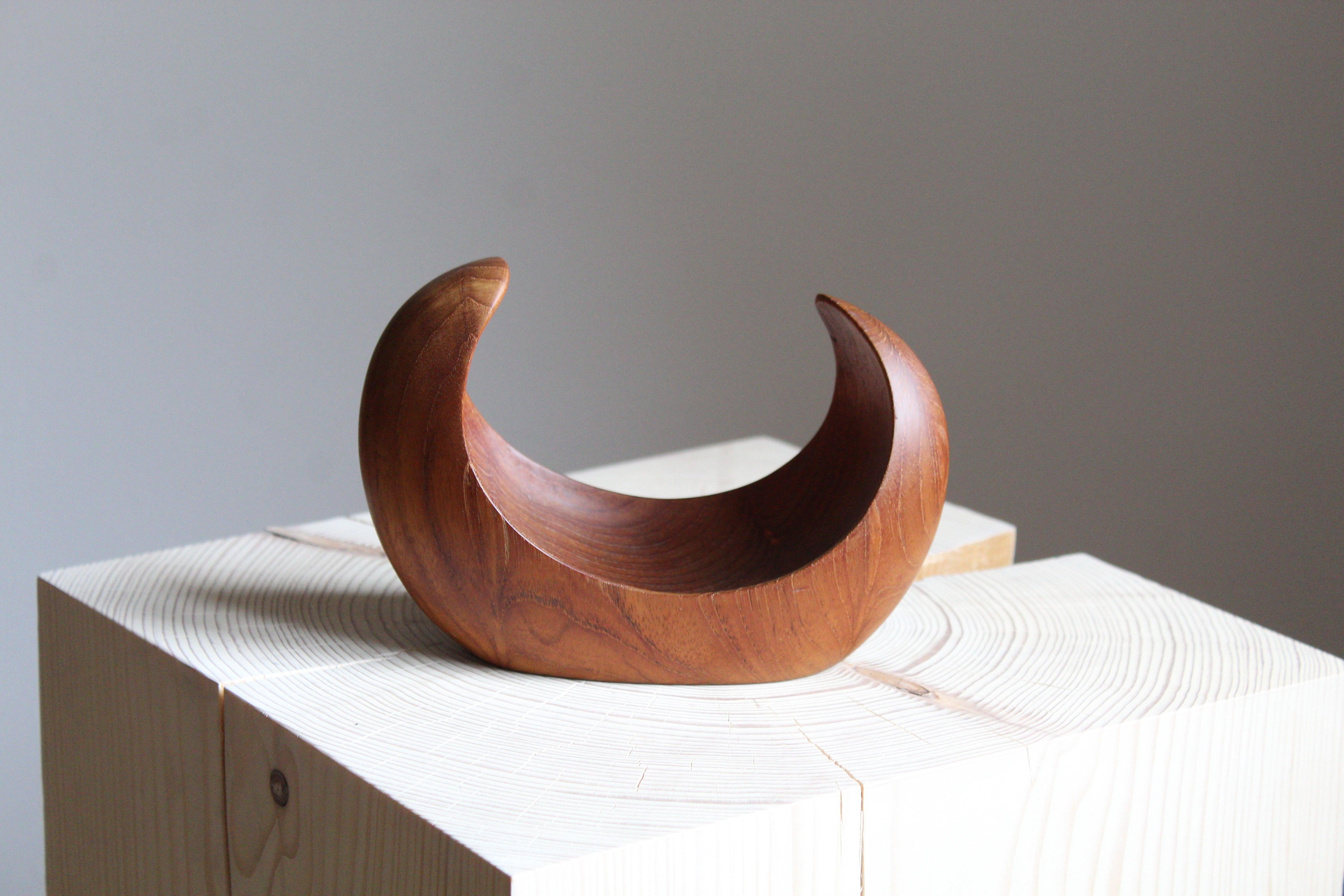 A small sculptural bowl, designed and produced in Sweden, 1950s. In solid teak. Signed. 

Other designers of the period include Stig Sandberg, Finn Juhl, Kay Boesen, Jens Quistgaard, and Peder Moos.