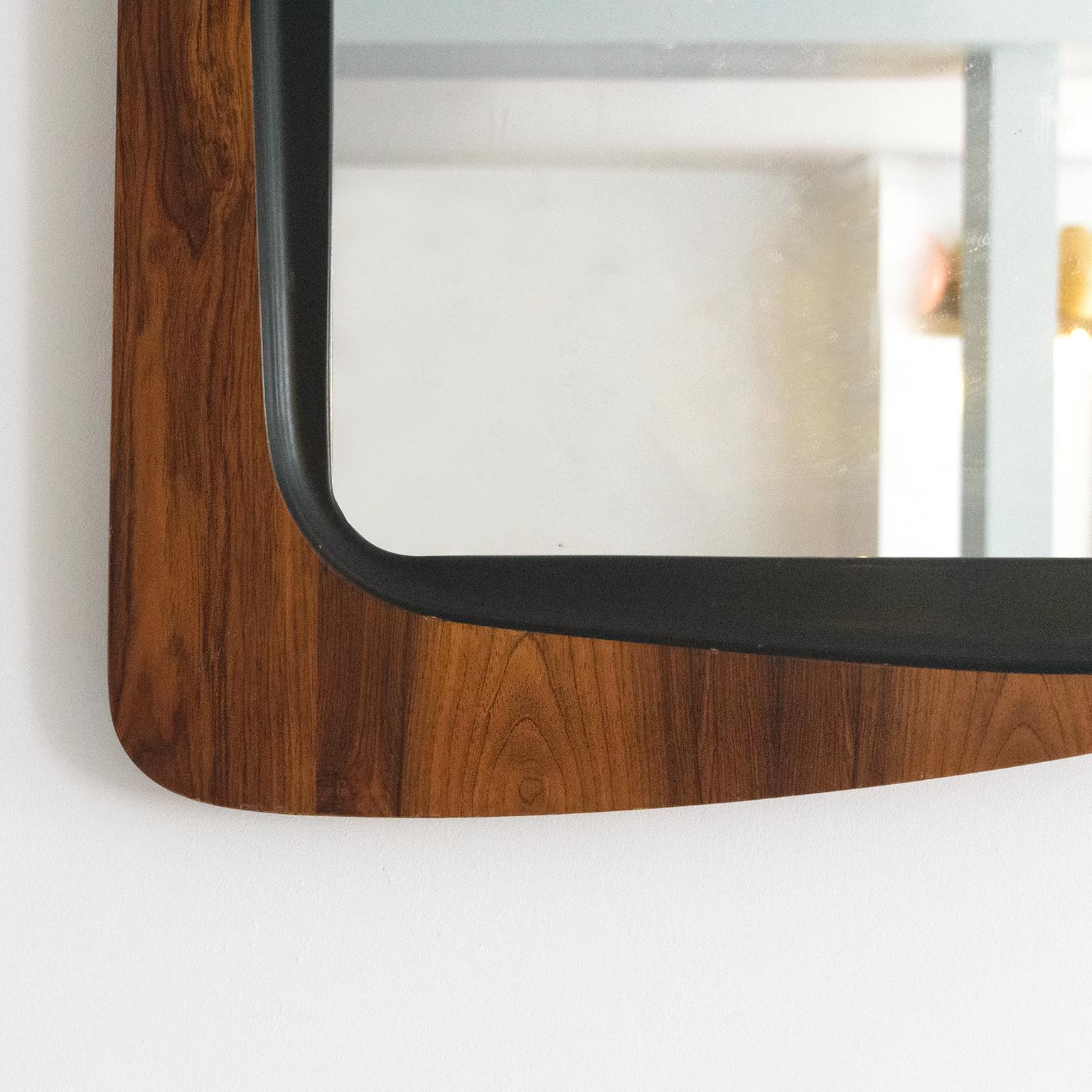 Swedish asymetrical rosewood wall mirror from Glas & Trä, Hovemantorp, Sweden In Good Condition For Sale In New York, NY