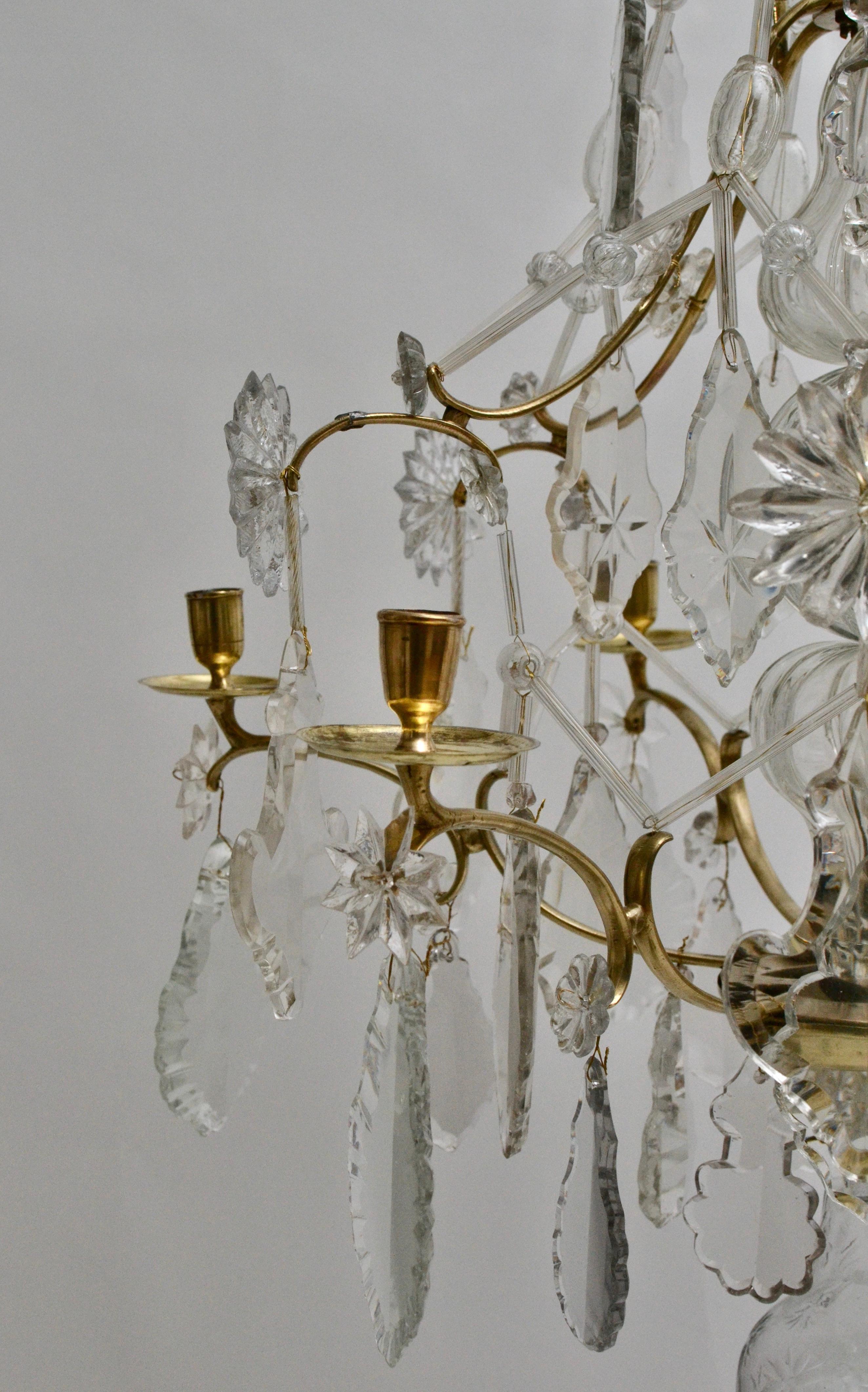 A Swedish Baroque chandelier. Made in Stockholm, 18th century. Pear-shaped brass cage with leaf-shaped cut crystals. Very genuine and nice condition.