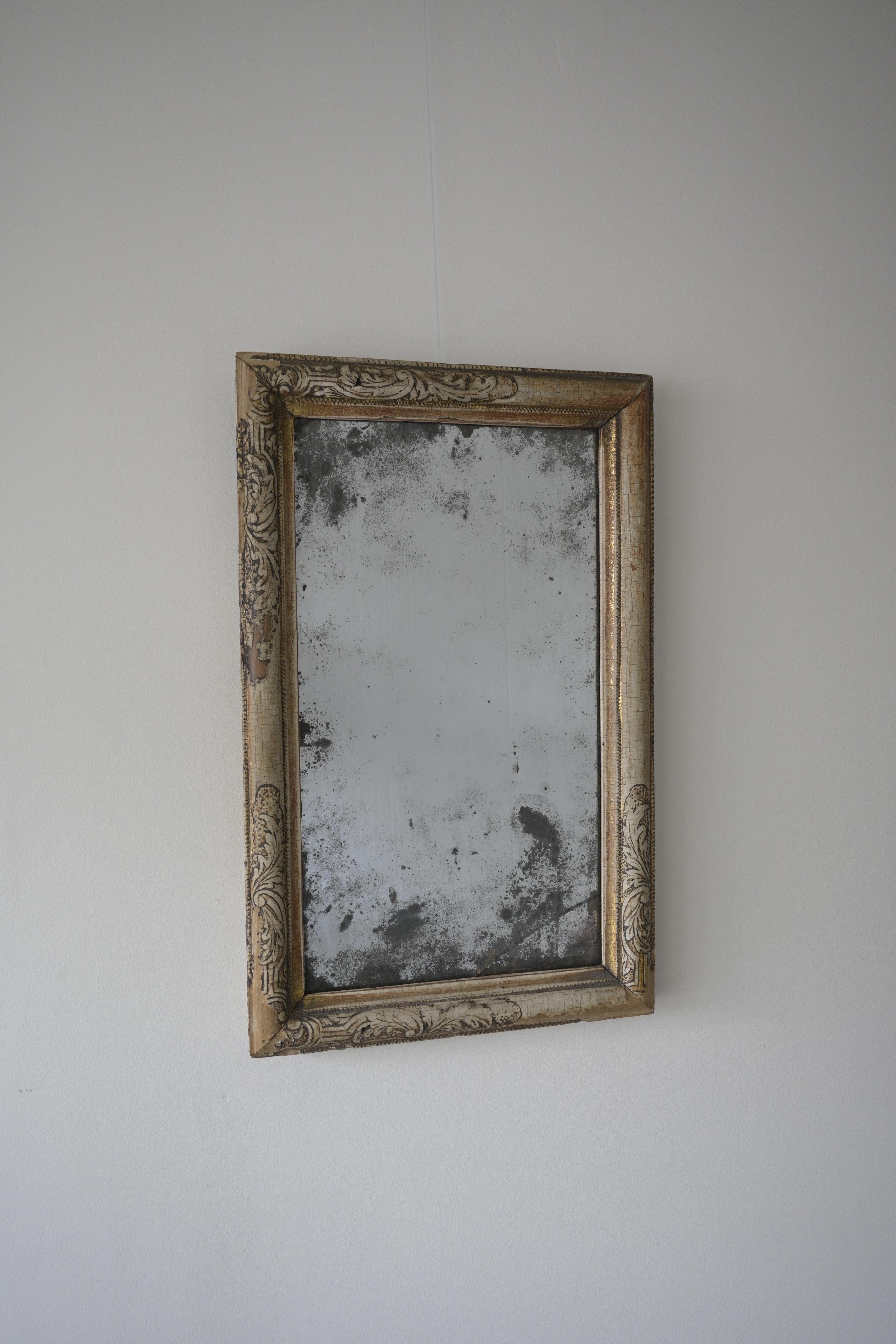 Swedish Baroque Mirror ca 1730

What do you do when something old gets broken? Well, in the old days, it was common to create something new from the parts. This mirror was originally much larger, but even in its current form, it retains some of the
