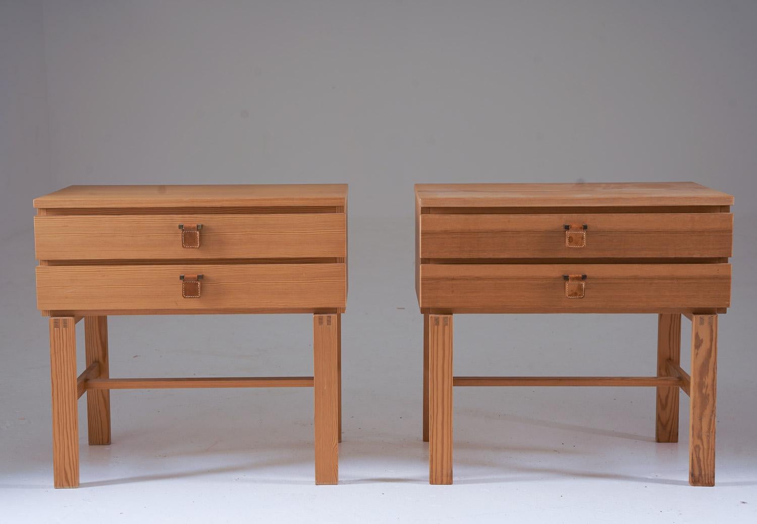 A pair of bedside tables Model 