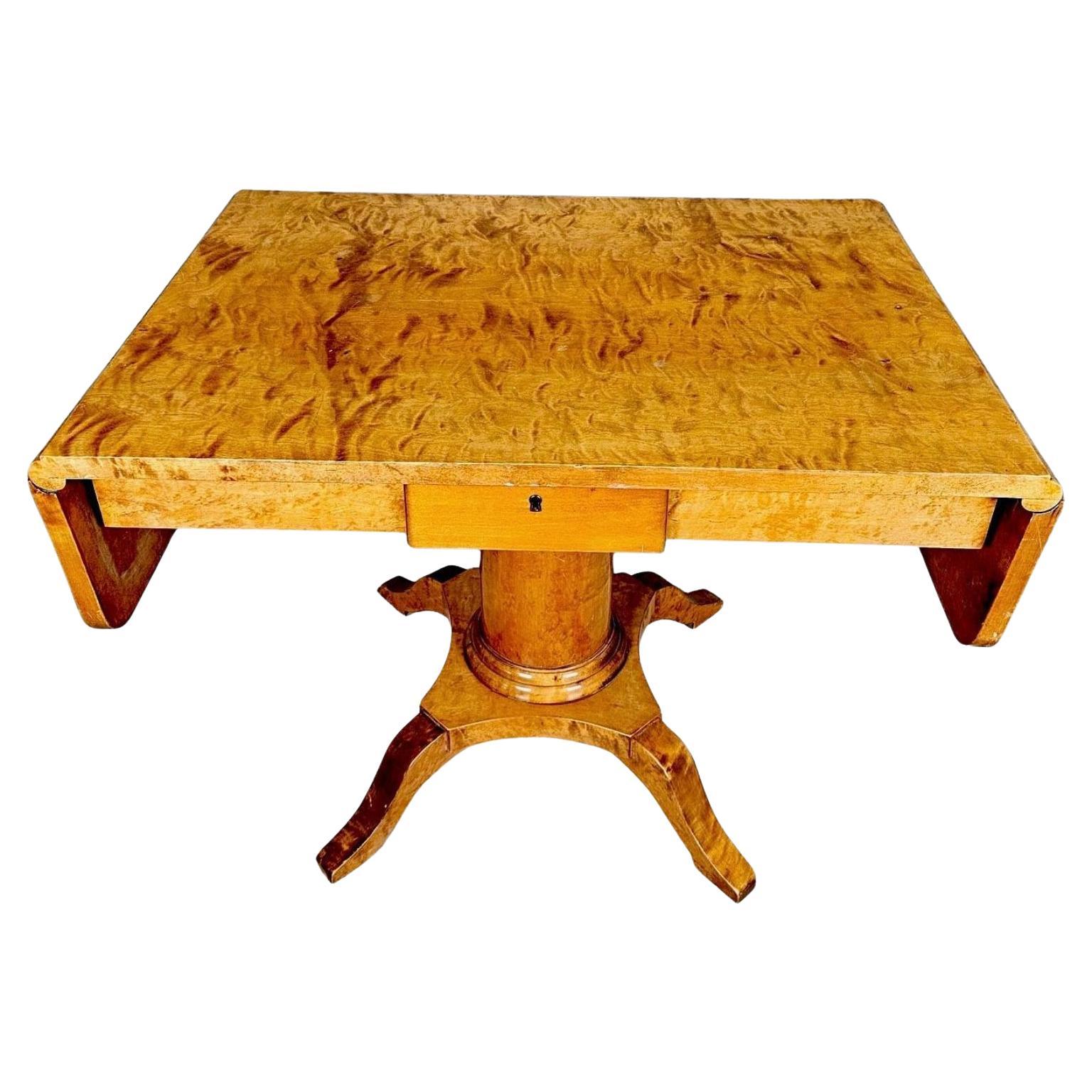 Swedish Biedermeier Drop-Leaf Pedestal Table Golden Birch 142cm For Sale