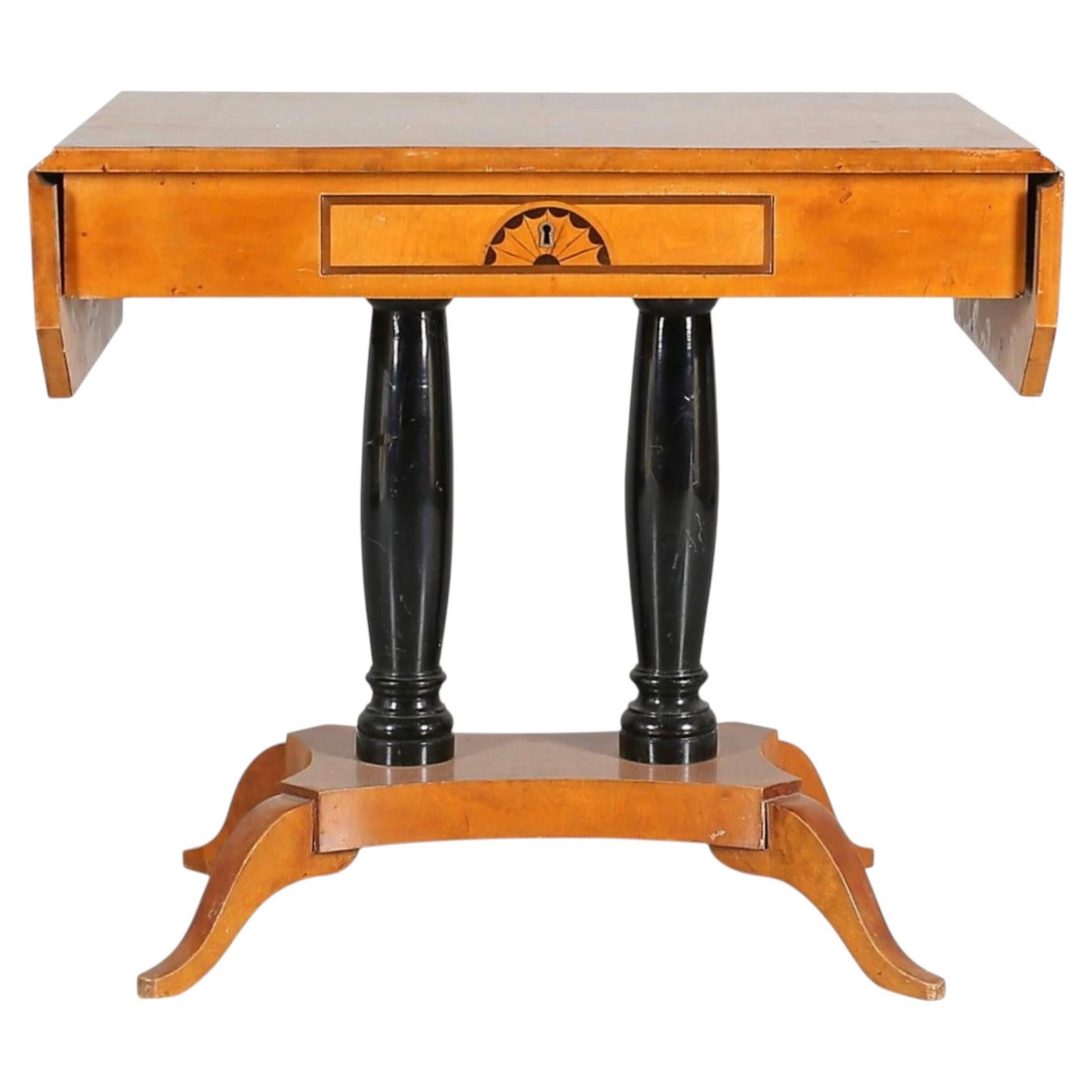 What is a pedestal table?
