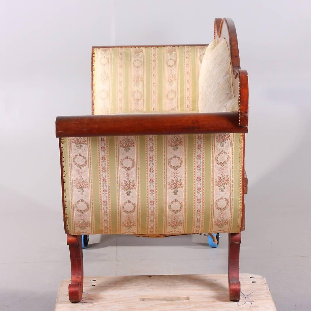 Antique Swedish Biedermeier Empire sofa in top grade quilted figured veneers in a rich deep French polish finish. 

Lovely curved legs, arms and back with a fully sprung seat and webbed back. It’s a very unusual shape for a Swedish Biedermeier