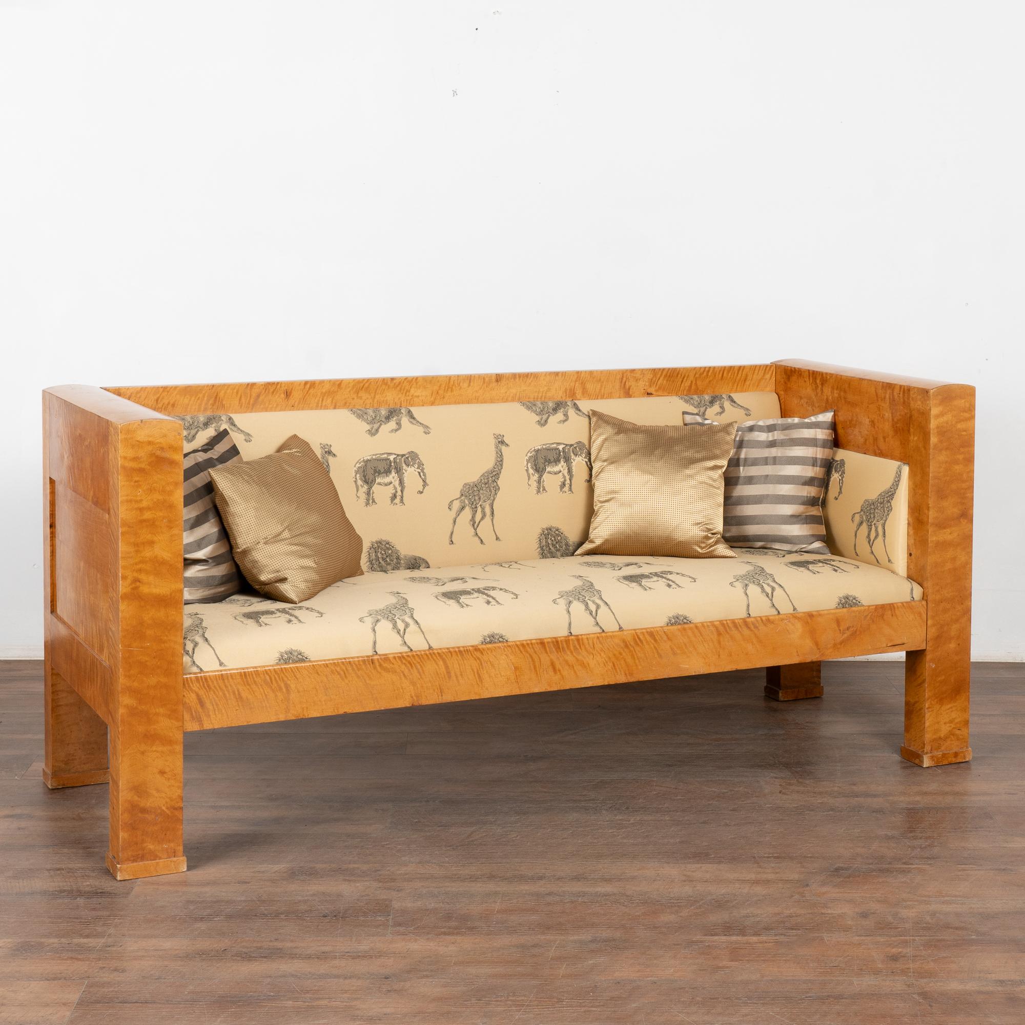 This Swedish Biedermeier sofa is made stunning by the birch veneer. The substantial lines and presence of this bench will make a dramatic impact in any setting.
Frame is solid, stable and ready for use. Typical signs of age and use include