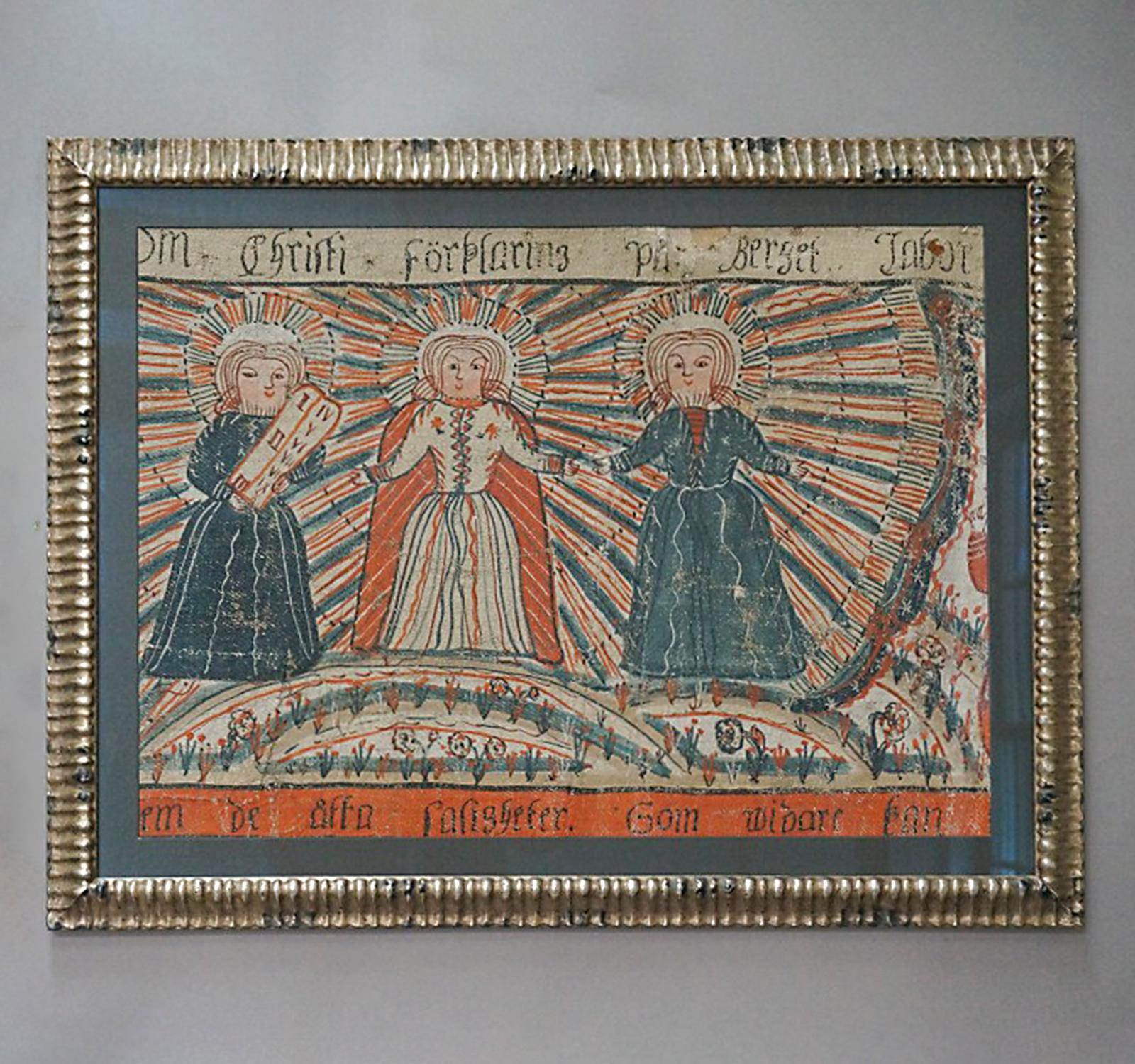 Fragment of larger Swedish bonad dated 1818 and illustrating the transfiguration of Jesus with Moses and Elijah on either side. We see the three men on a mountain top with the light of glory emanating from the central figure. Tempera on homespun