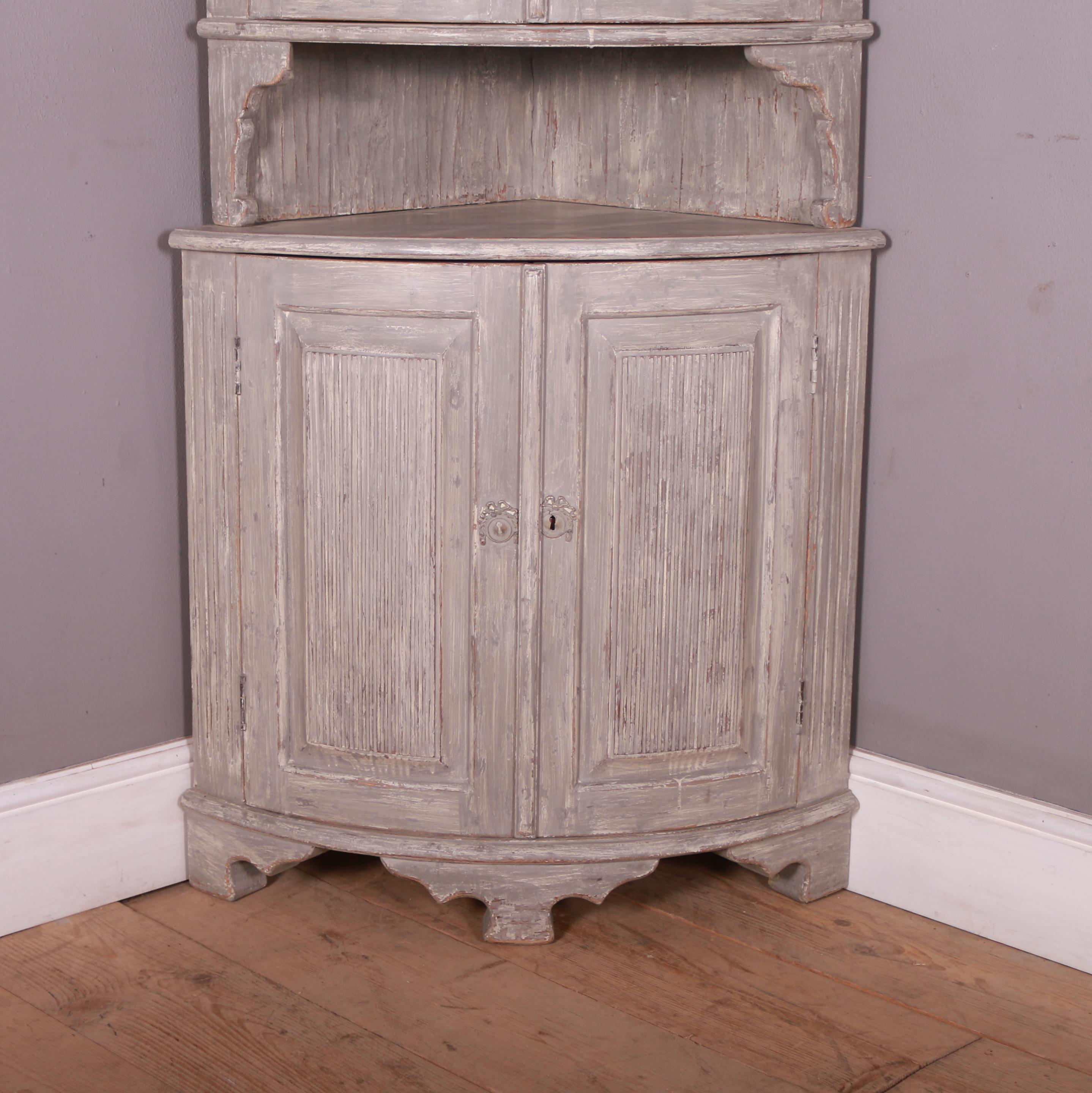 Late 19th C Swedish bowfronted 4 door corner cupboard with reeded panels. 1880.

Will fit into a 22