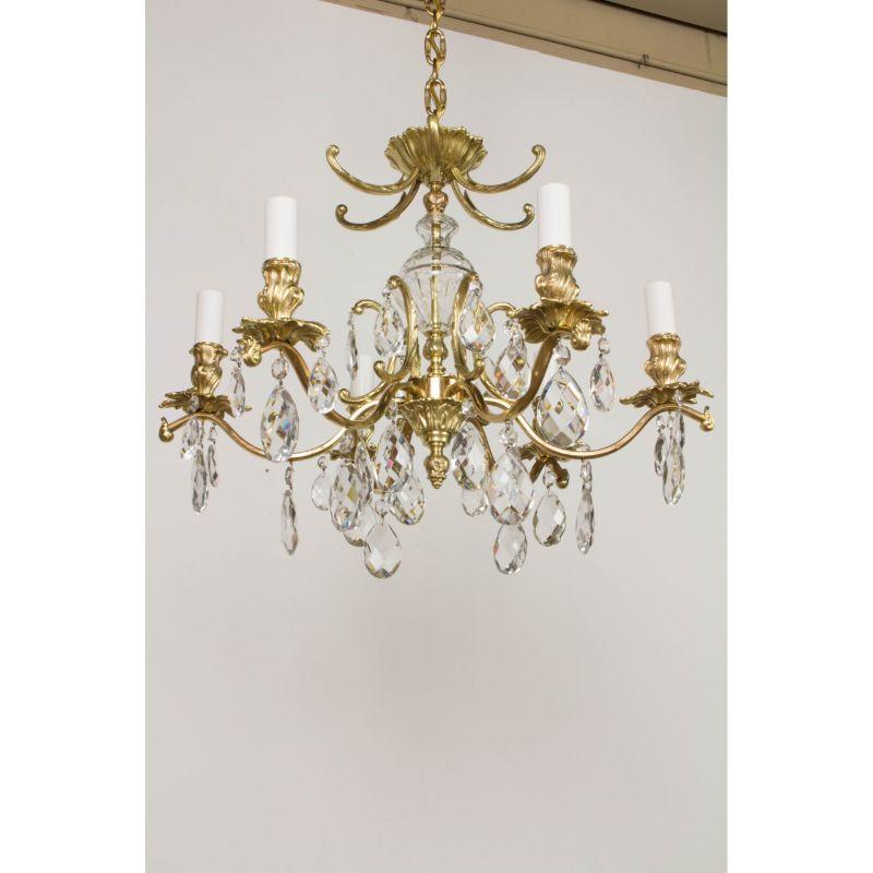 Swedish Brass and Crystal Chandelier with Six Lights, Mid 20th Century. Completely restored, cleaned and rewired. Ready to install. Height is minimum drop.

Dimensions: 26″H x 22″D