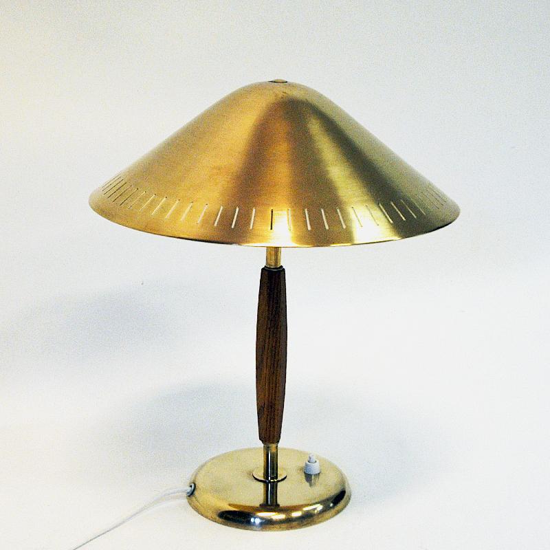 Polished Swedish Brass and Elm Tablelamp by Harald Notini for Böhlmarks, 1940s