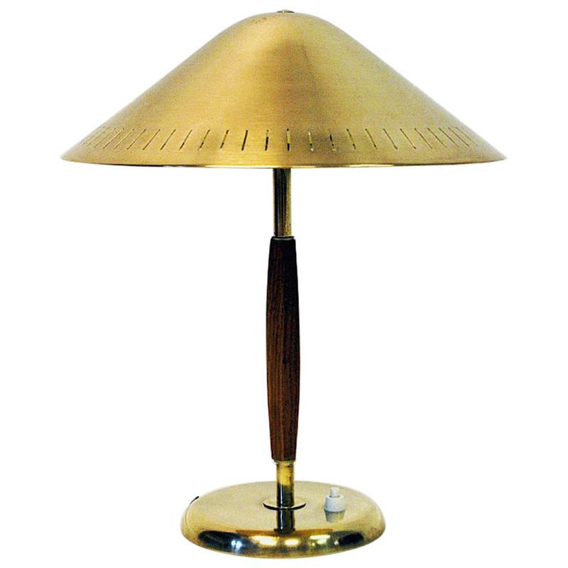 Swedish Brass and Elm Tablelamp by Harald Notini for Böhlmarks, 1940s