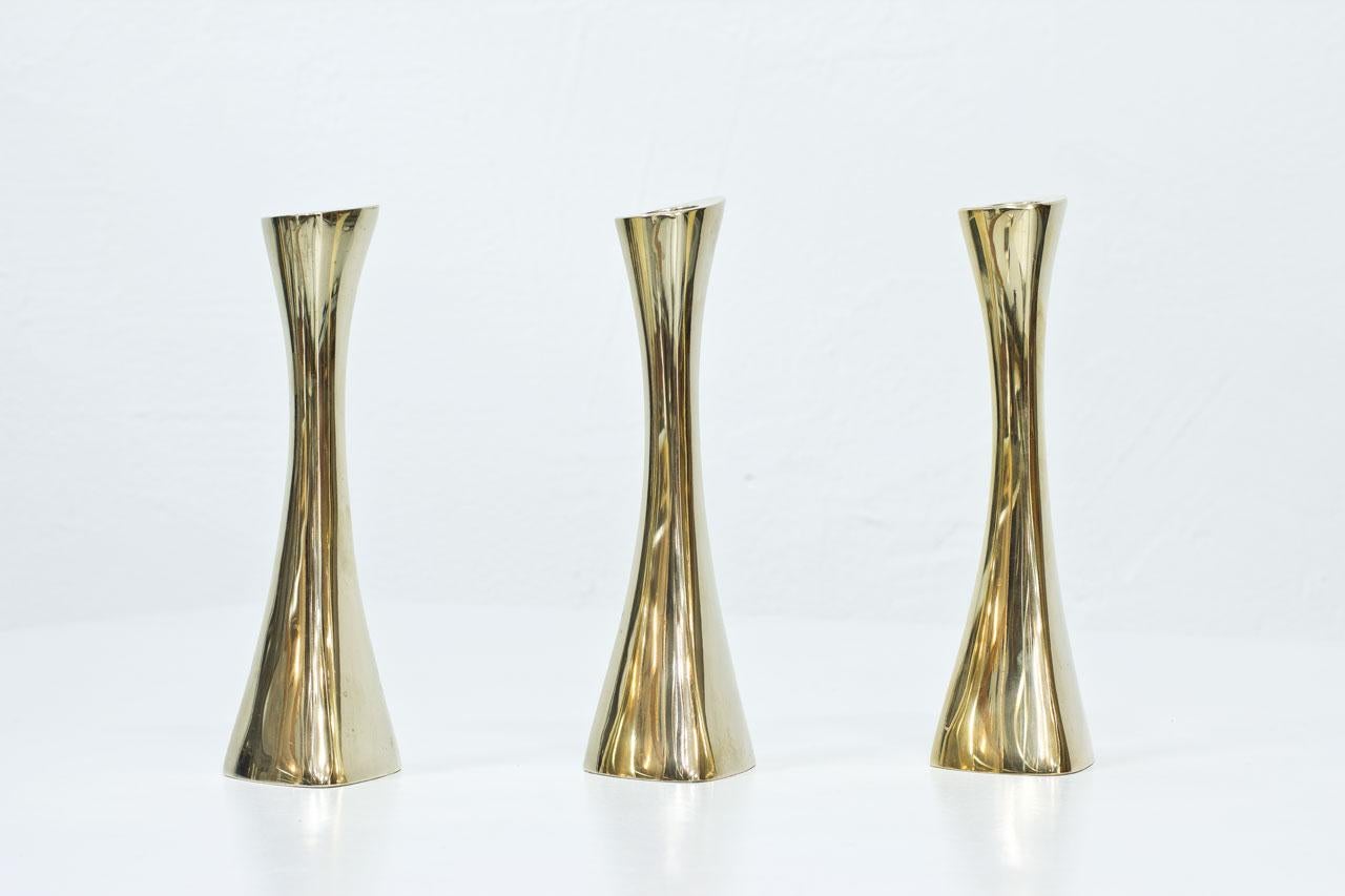 Organic shaped polished brass candlesticks designed by K.E. Ytterberg for BCA Eskilstuna in Sweden during the 1960s.