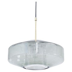 Schwedische Pendelleuchte aus Messing und Glas von Carl Fagerlund für Orrefors, 1960er Jahre