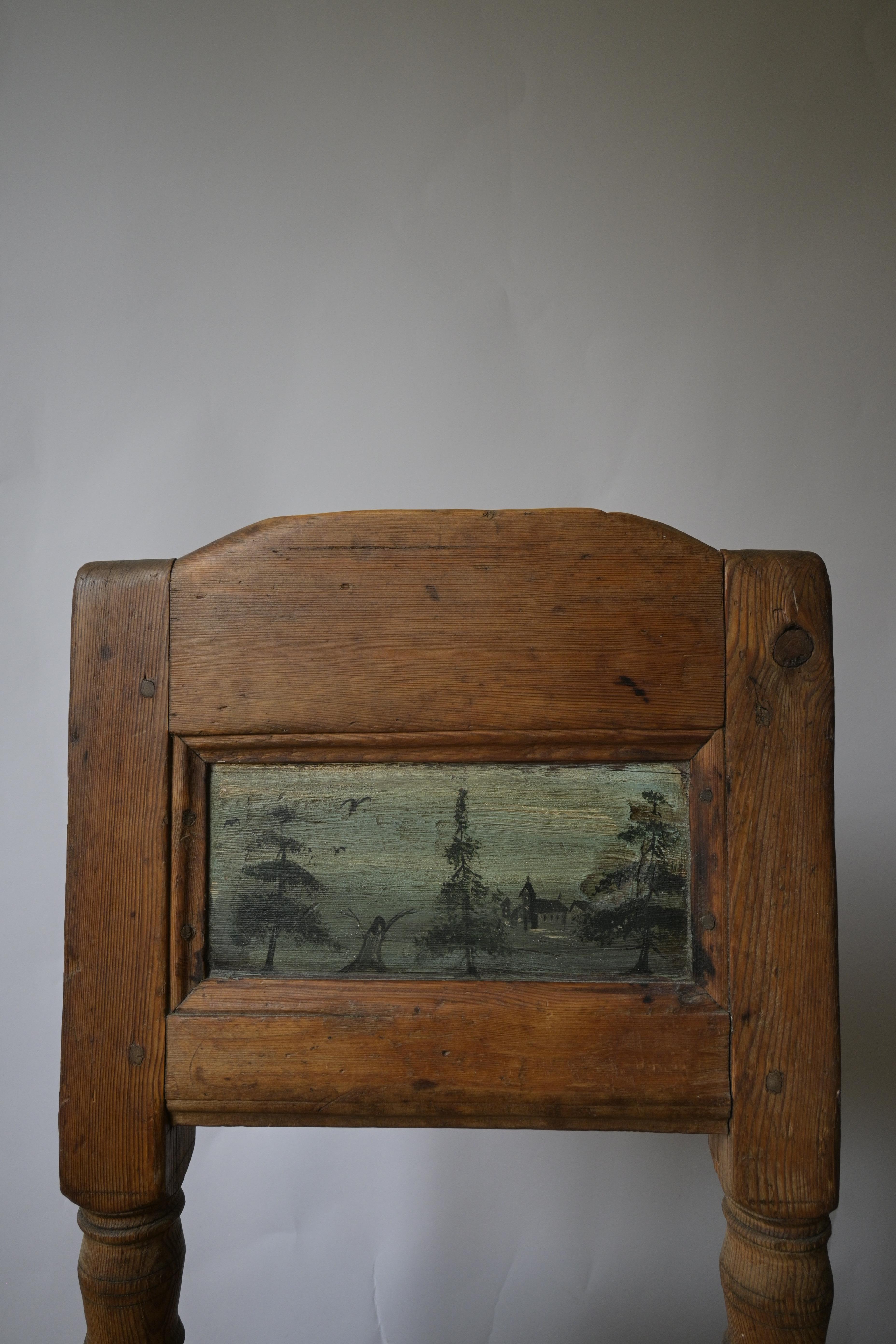 Brick Chair with Painted Panel, Dalarna, Sweden circa 1770–1779

The chair has a stunning patina that reflects its age and history, making it a true collector’s piece.

The painted panel on the backrest is a work of art in itself, featuring a