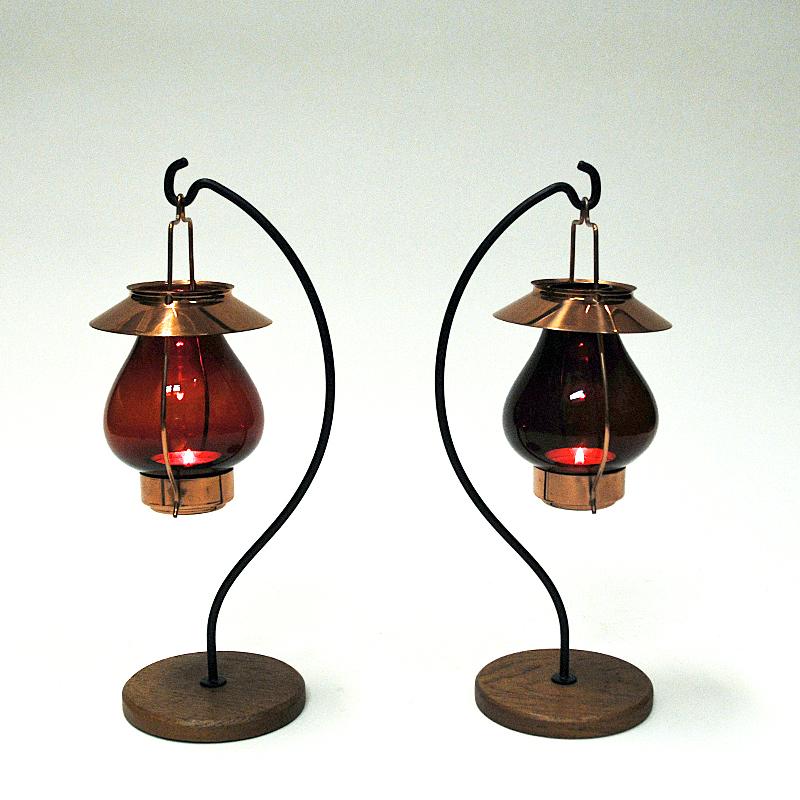Scandinavian Modern Swedish bronze Candle holders with red glass by Gunnar Ander, Ystad Metall 1960s