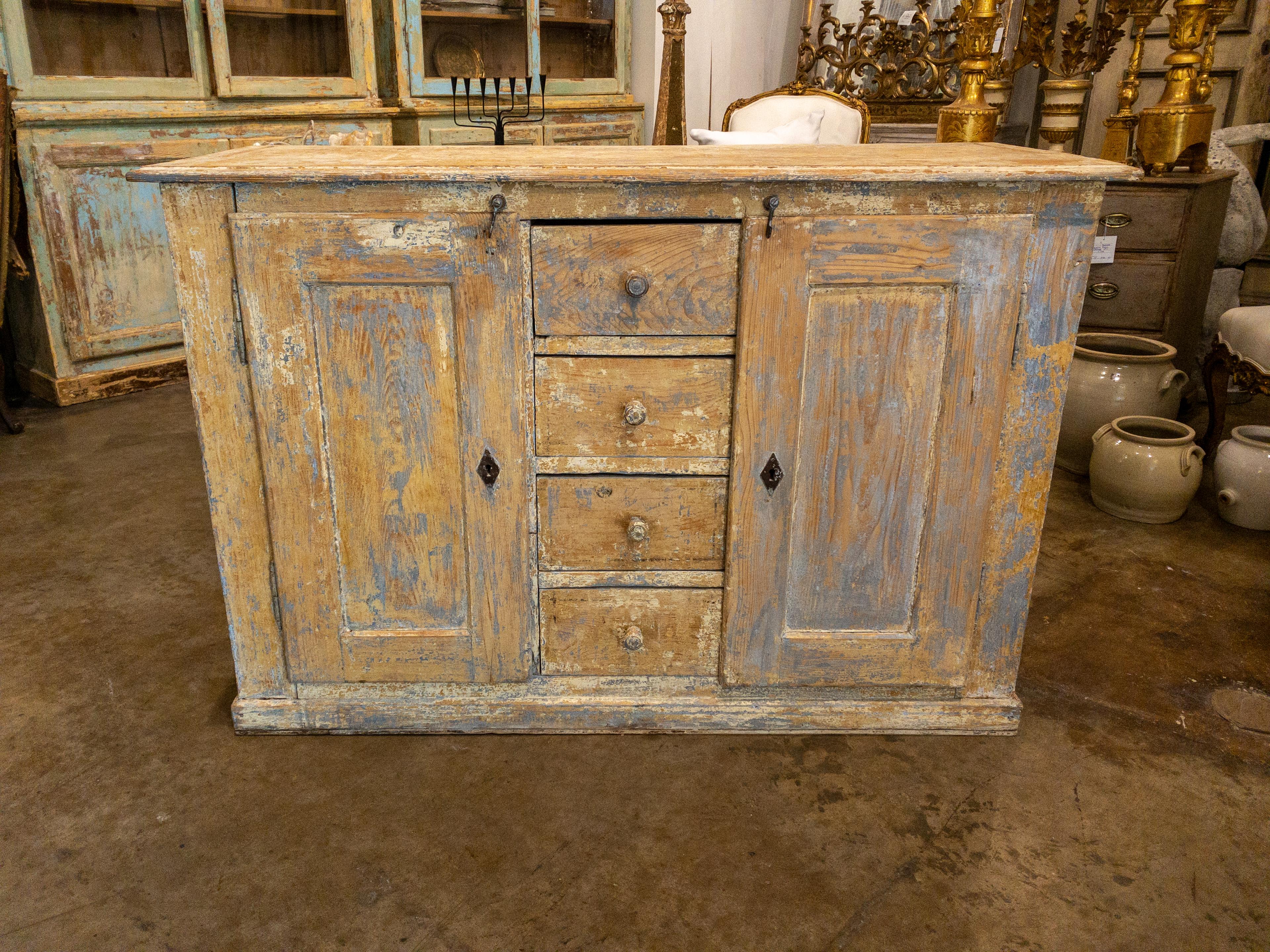 The Swedish Painted Buffet is a charming and distinctive piece of furniture that captures the essence of Swedish craftsmanship and design. Its simple yet captivating aesthetics make it a standout addition to any interior.

This buffet stands on a