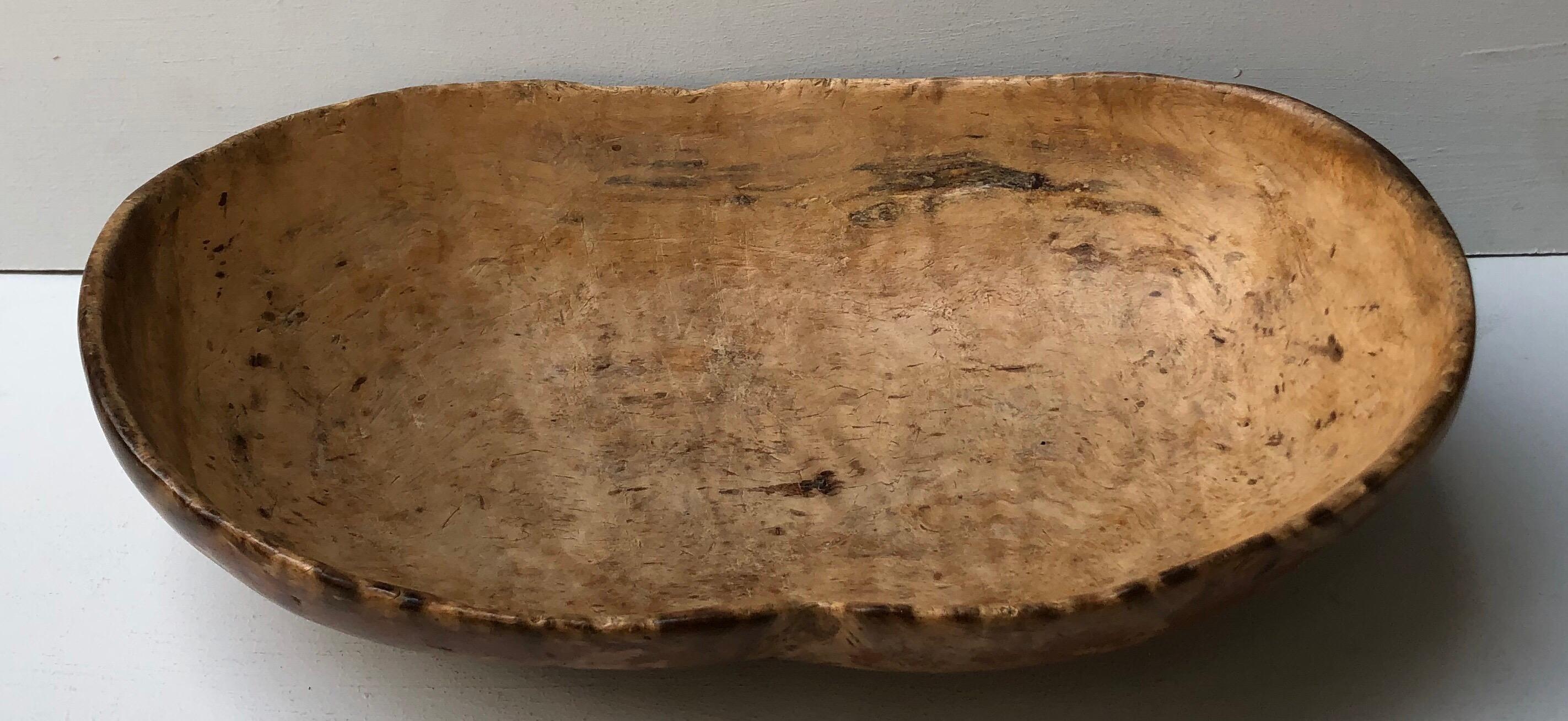 Fine early 19th century Swedish root burl bowl retaining traces of original mustard and ox blood read paint and having lovely organic form with excellent patina.