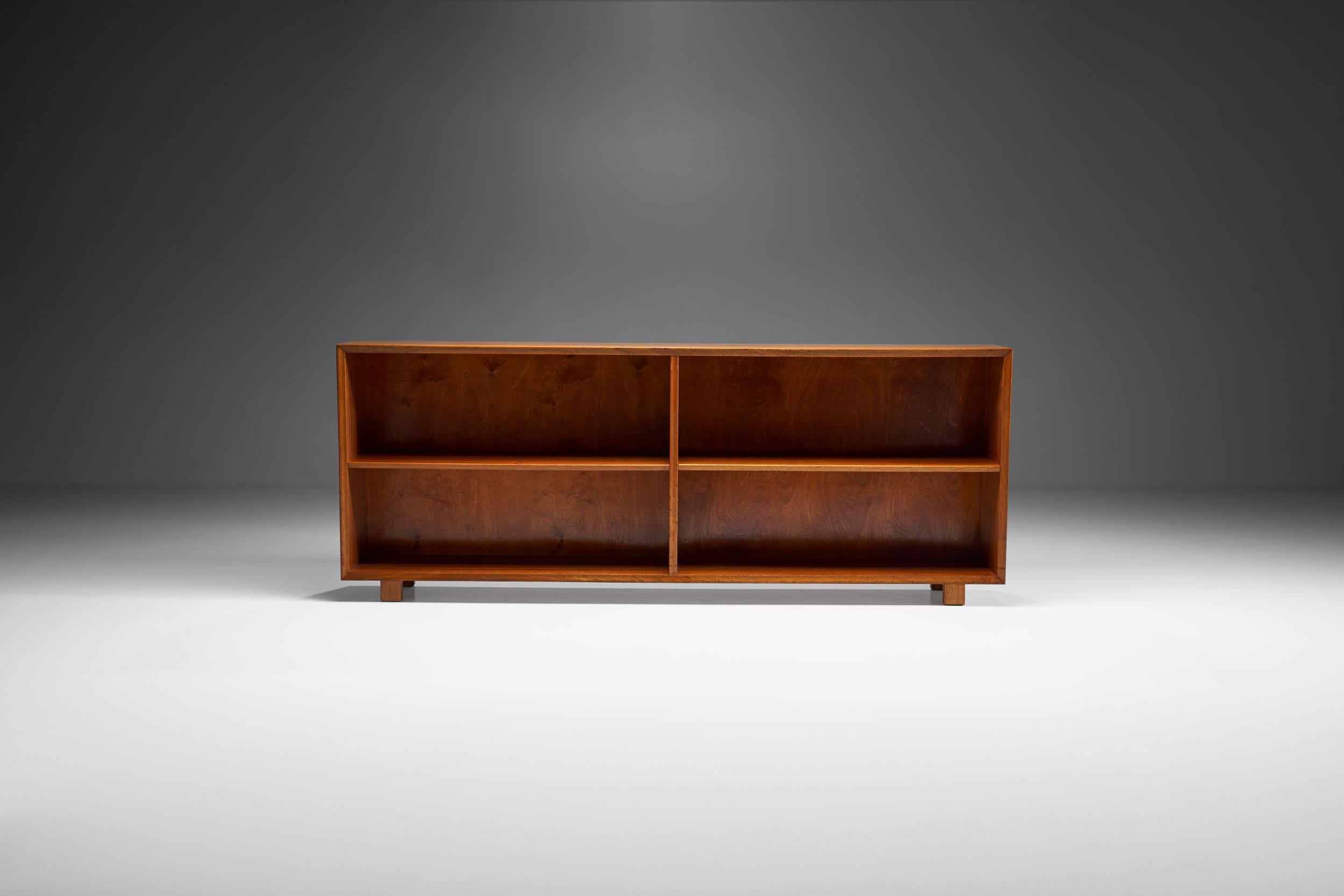 This sideboard is a beautiful example of the change in taste and design choices at the start of the midcentury design era in the early 1940s.

Elegant in its simplicity, this sideboard puts the emphasis on showcasing the material and Swedish
