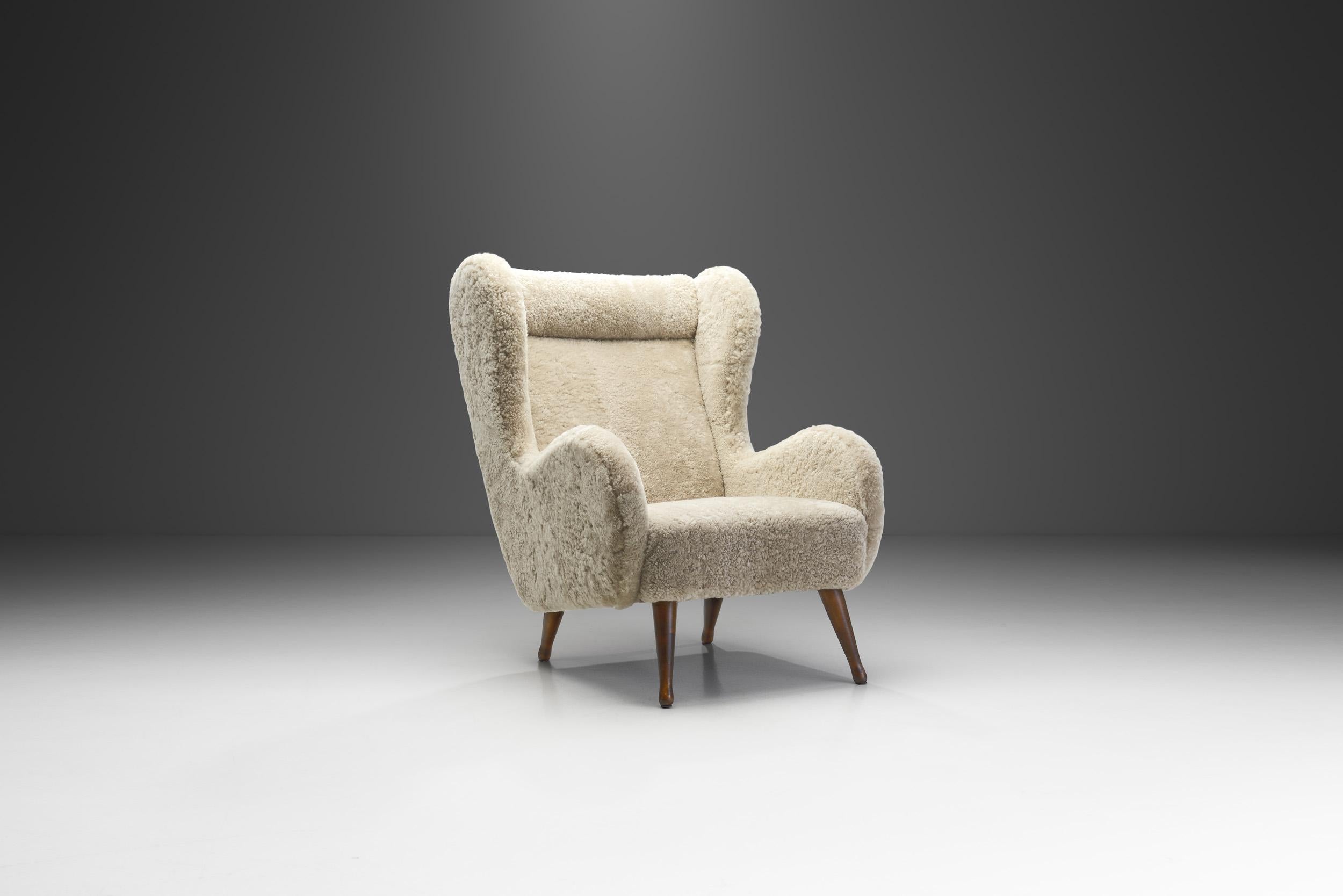 Throughout Scandinavia, there's a long history of pride in craftsmanship using natural materials like wood. This is especially true for Sweden. This unique 1940s winged armchair is a great representation of the quality and craftsmanship of Swedish