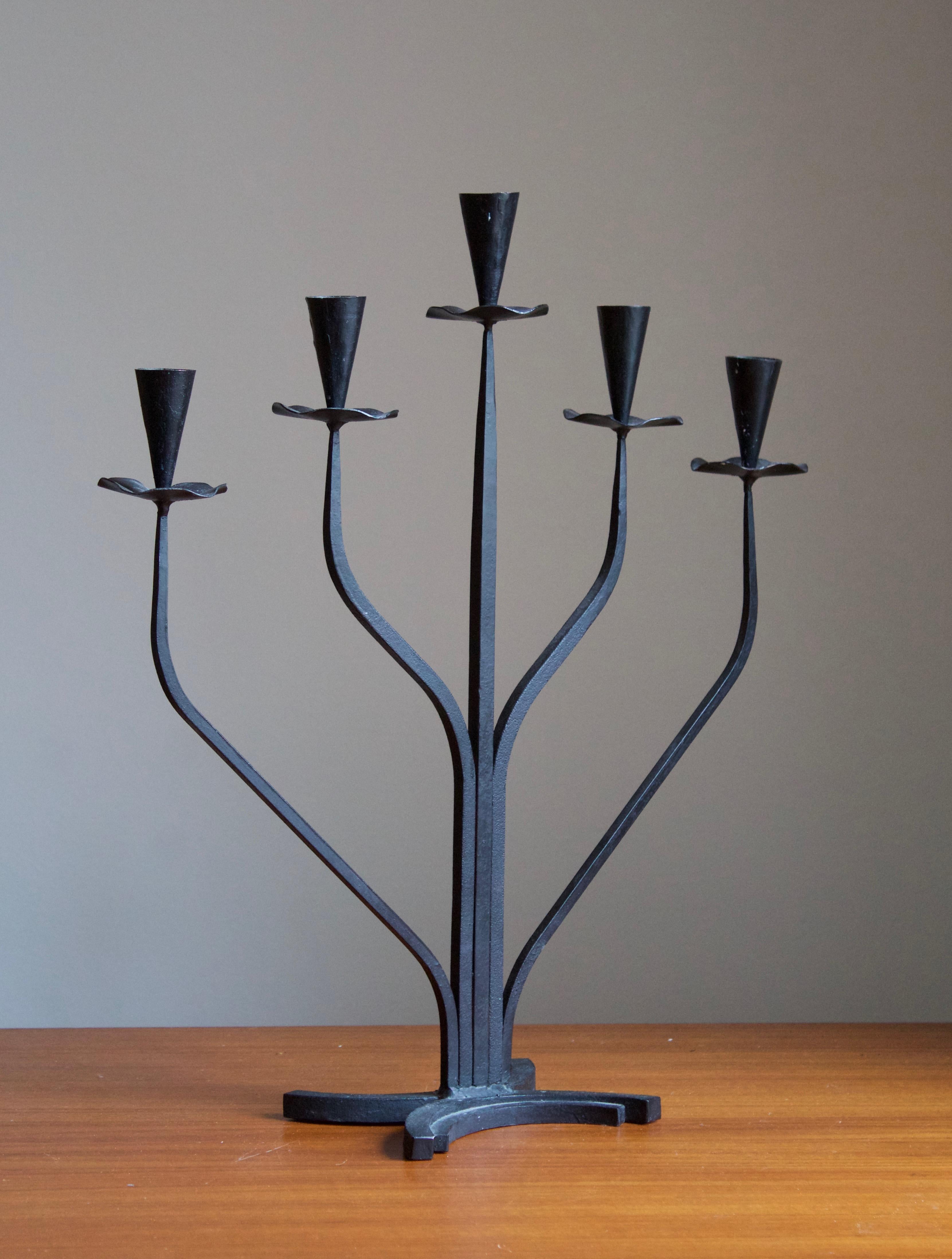 A five-armed candelabra. Made in Sweden, c. 1940s-1950s.