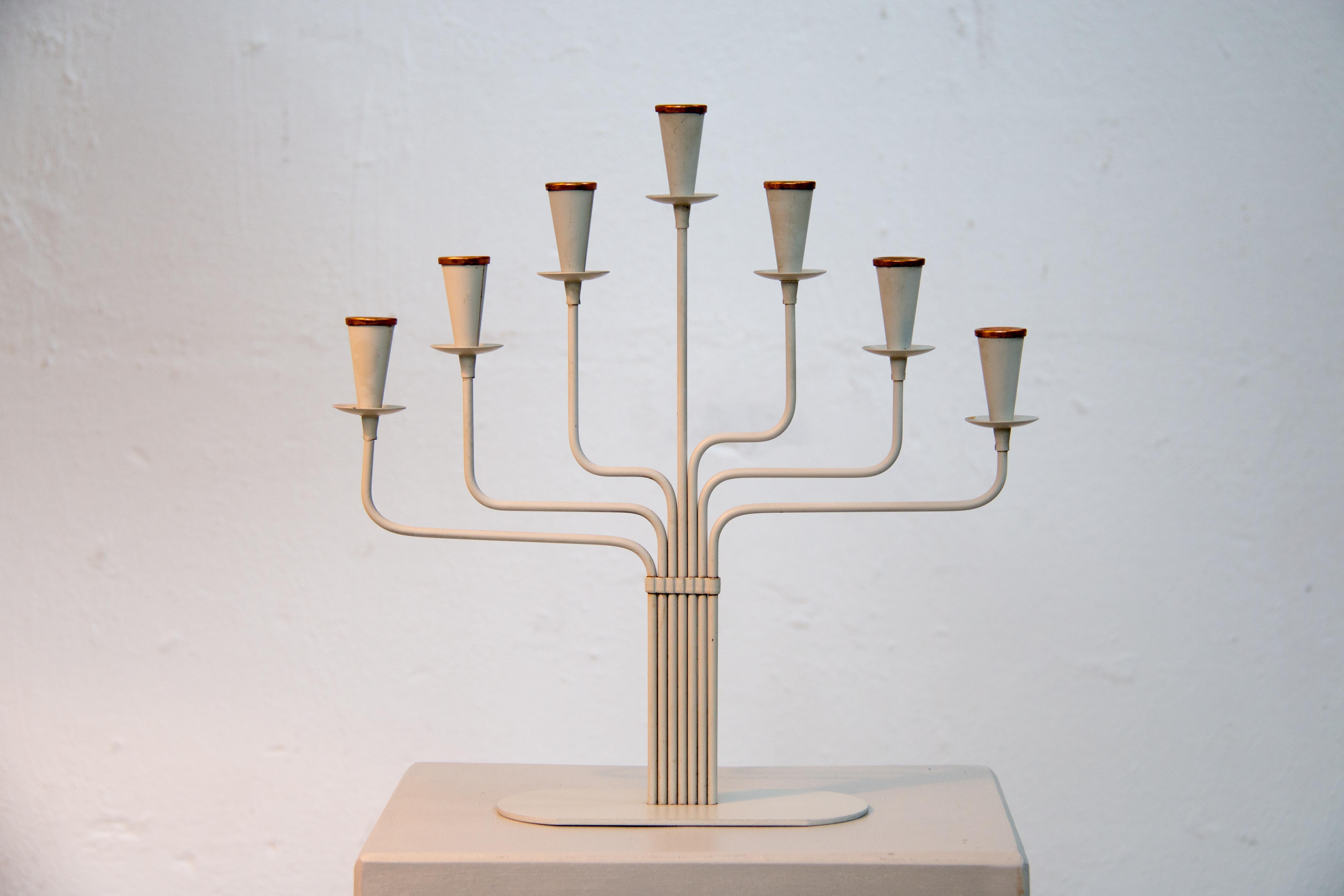 Beautiful candelabra by Gunnar Ander for Ystad Metall
in rare grey colour with nice brass details