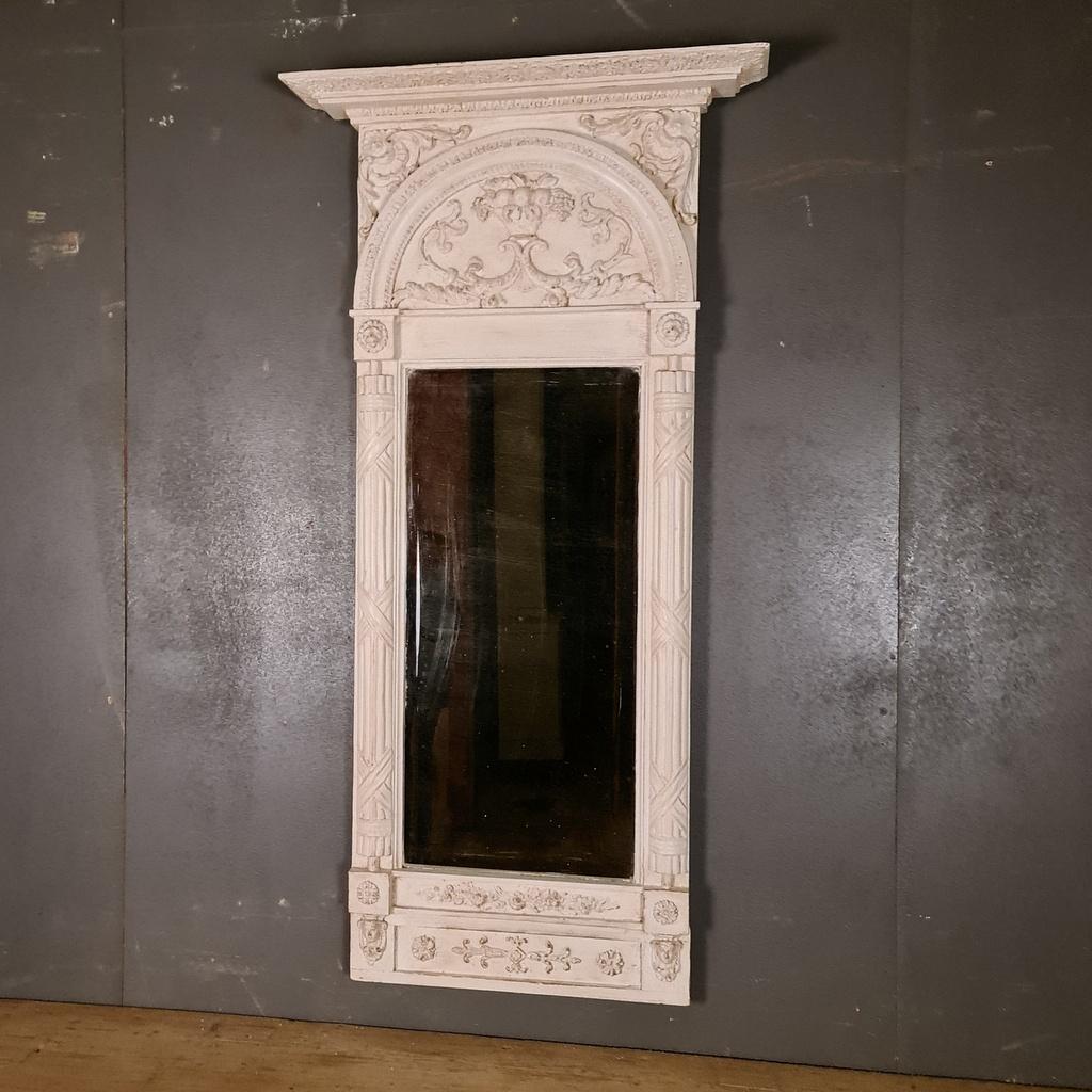 19th century carved and painted pier mirror with original mirror plate, 1890.

Dimensions:
28 inches (71 cms) wide
5 inches (13 cms) deep
55 inches (140 cms) high.