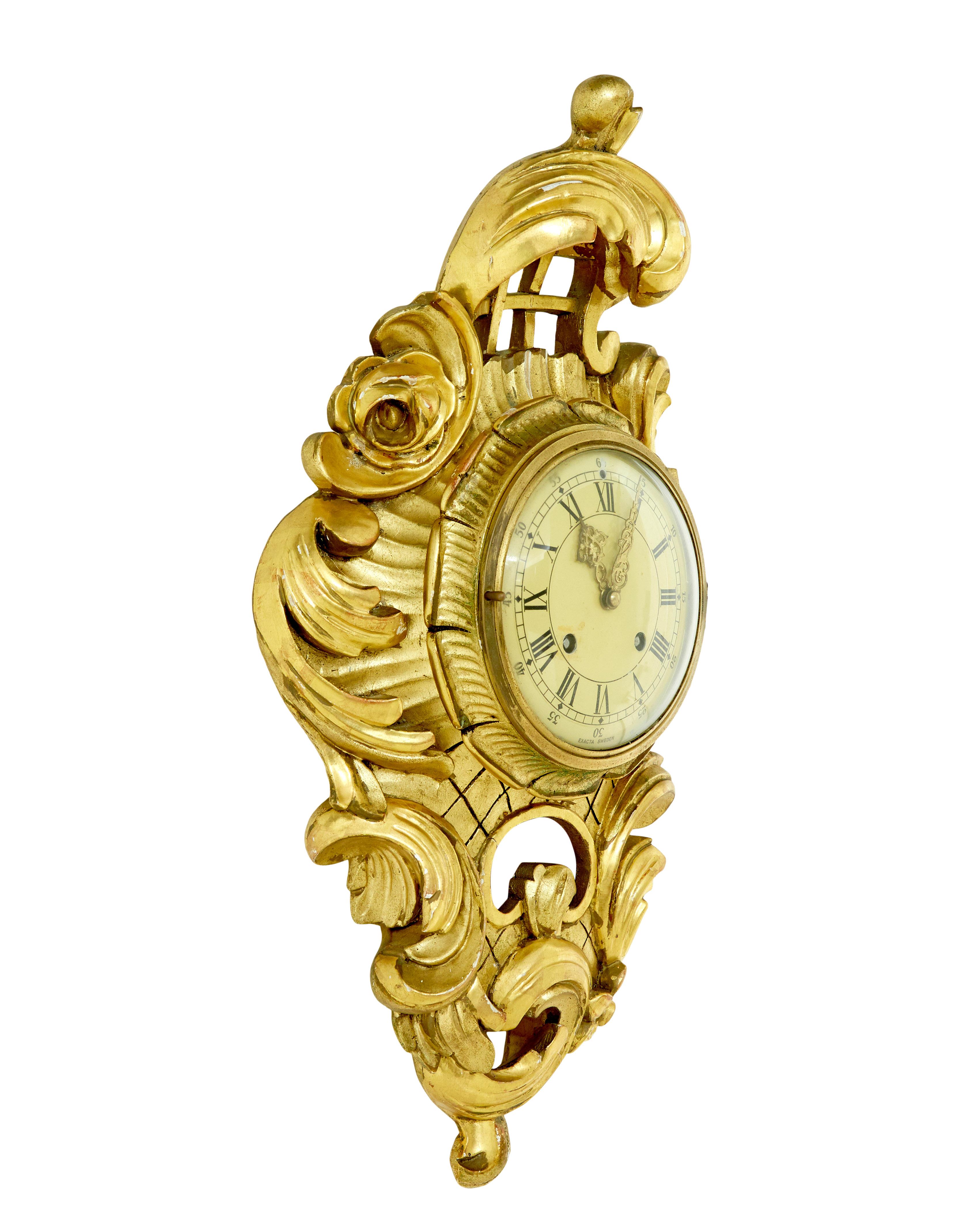 Mid century rococo revival gilt clock by westerstrand circa 1950.

Good quality rococo influenced clock by well known Swedish maker Westerstrand and fitted with a Hassleblad movement.

Fitted with a twin train 8 day movement and original pendulum. 