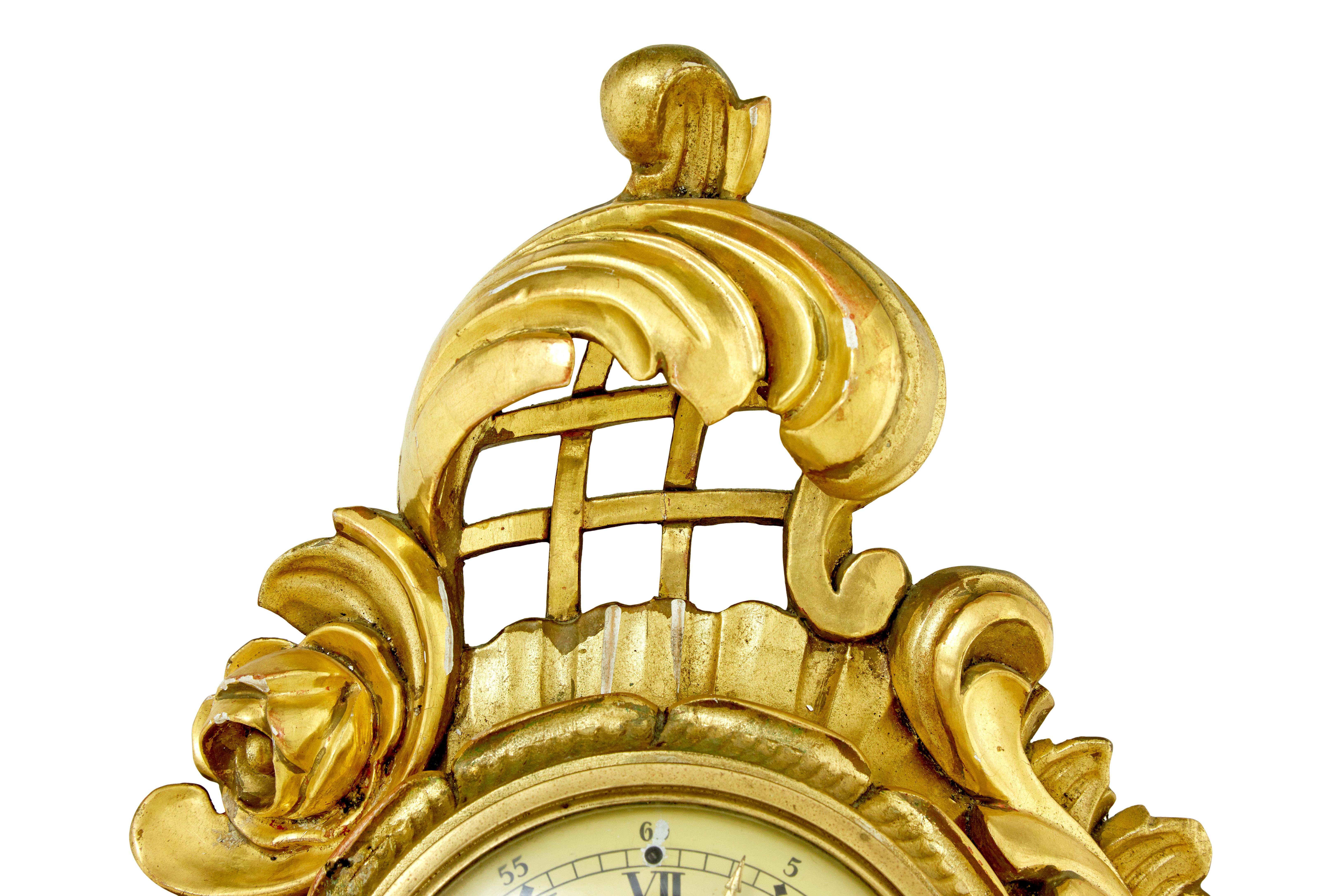 Rococo Swedish carved rococo revival gilt wall clock For Sale