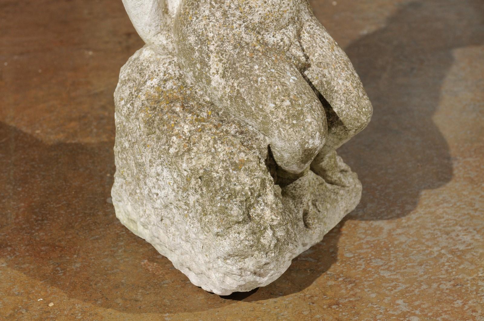 Swedish Carved Stone Garden Sculpture of a Putto Sitting on a Rock, 20th Century For Sale 1