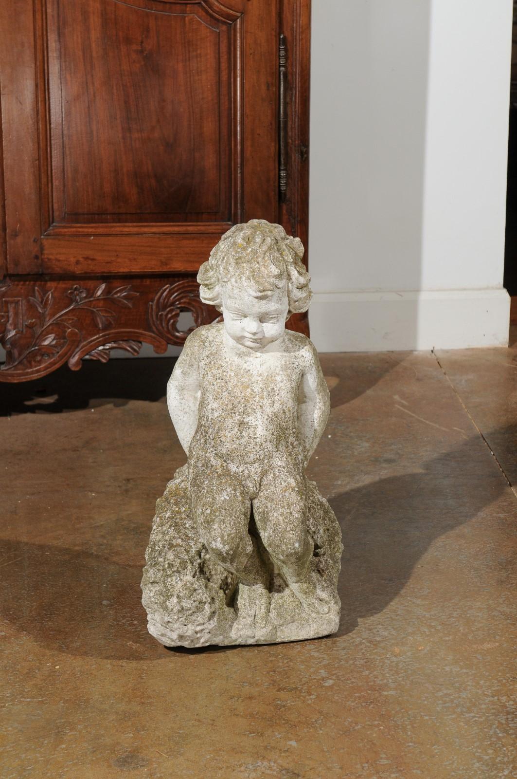 Swedish Carved Stone Garden Sculpture of a Putto Sitting on a Rock, 20th Century For Sale 2