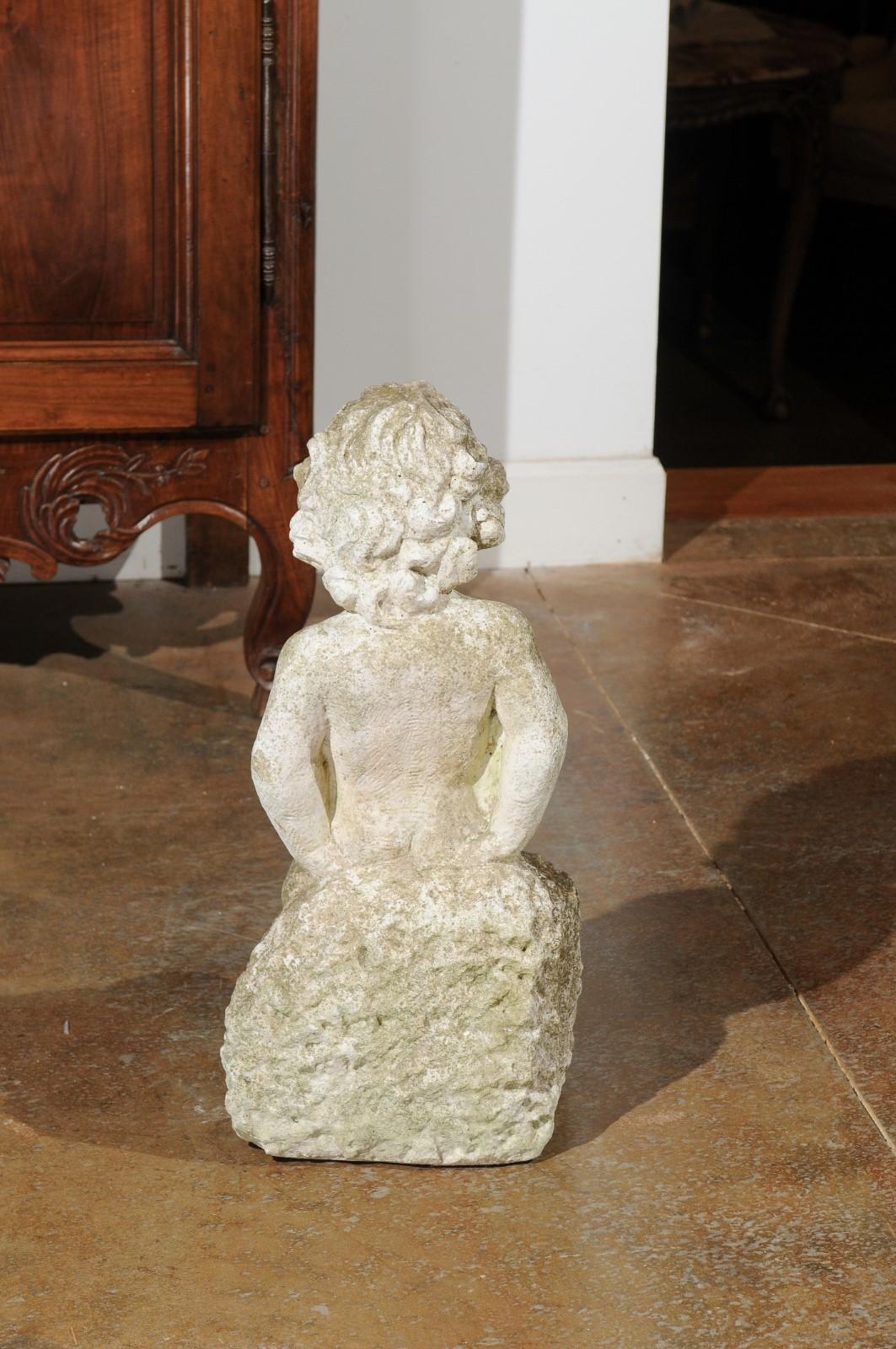 Swedish Carved Stone Garden Sculpture of a Putto Sitting on a Rock, 20th Century For Sale 5