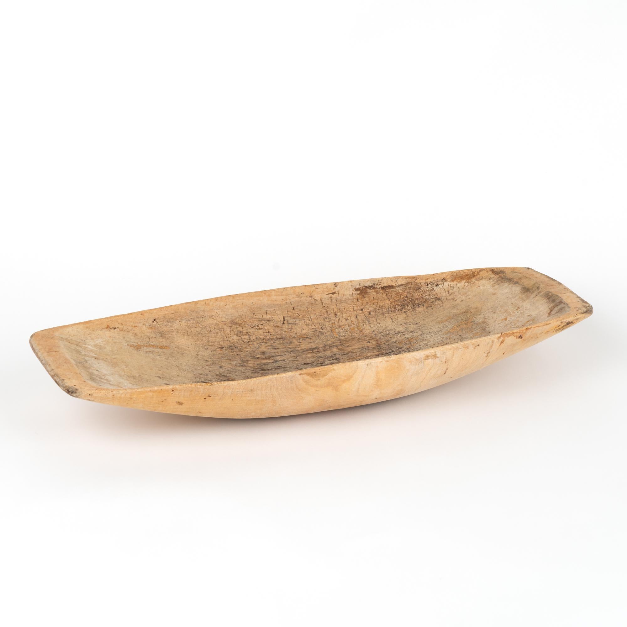 Original Swedish folk art pine carved wooden bowl with light patina. These bowls were used throughout families and often passed down generation to next generation. This bowl remains a highly functional item and now serve as a lovely decorative
