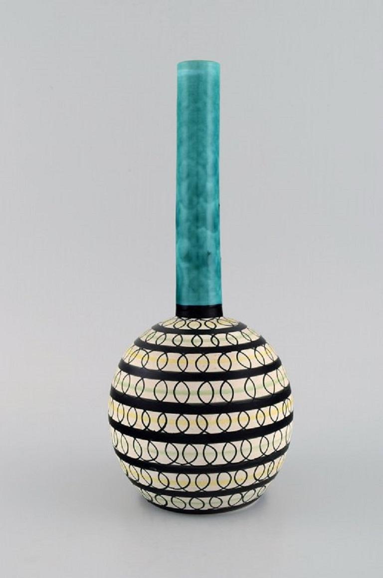 Swedish ceramicist. Unique vase in glazed stoneware. Colourful decoration. 
Dated 1959.
Measures: 29 x 13 cm.
In excellent condition.
Signed and dated.