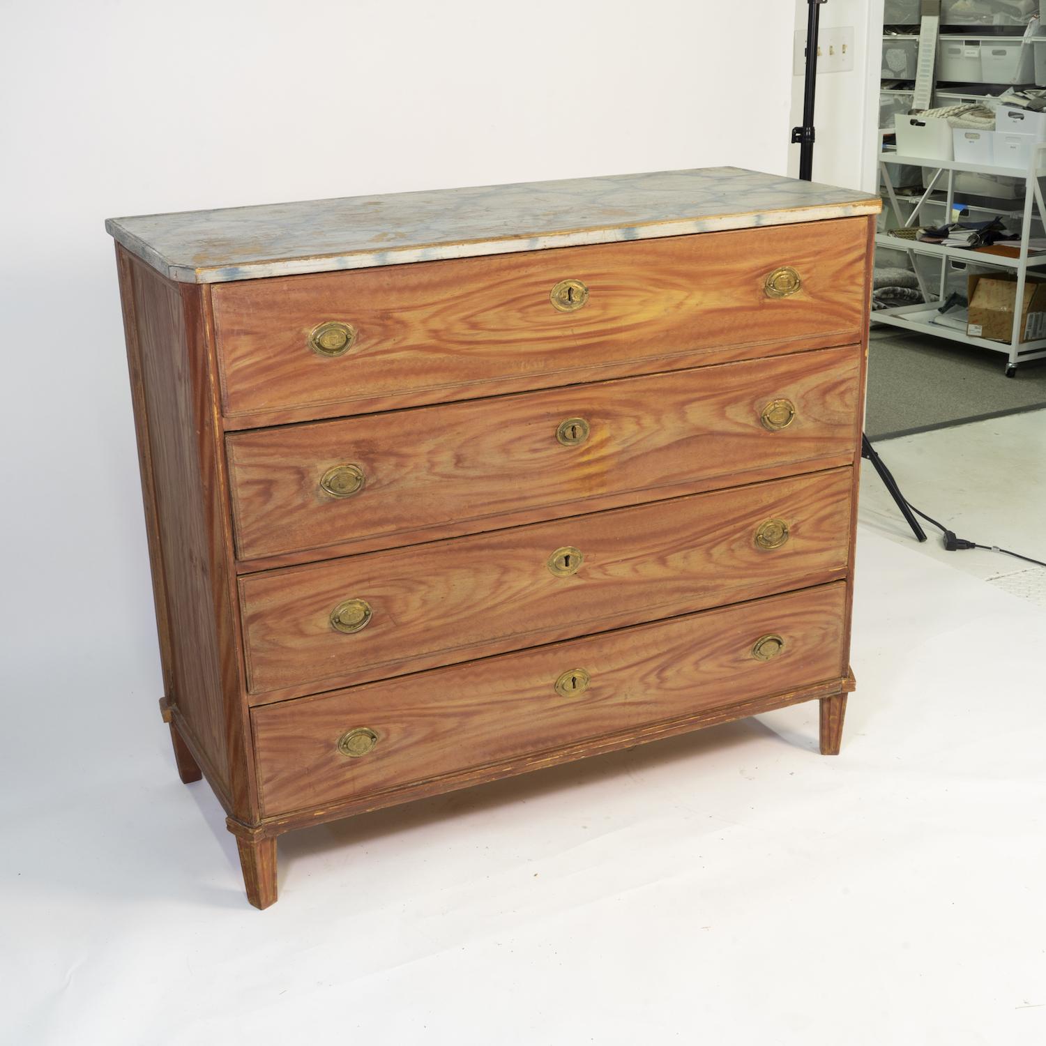 Swedish chest of drawers with hand painted faux bois and faux marble. Top drawer has a built in secretary desk.