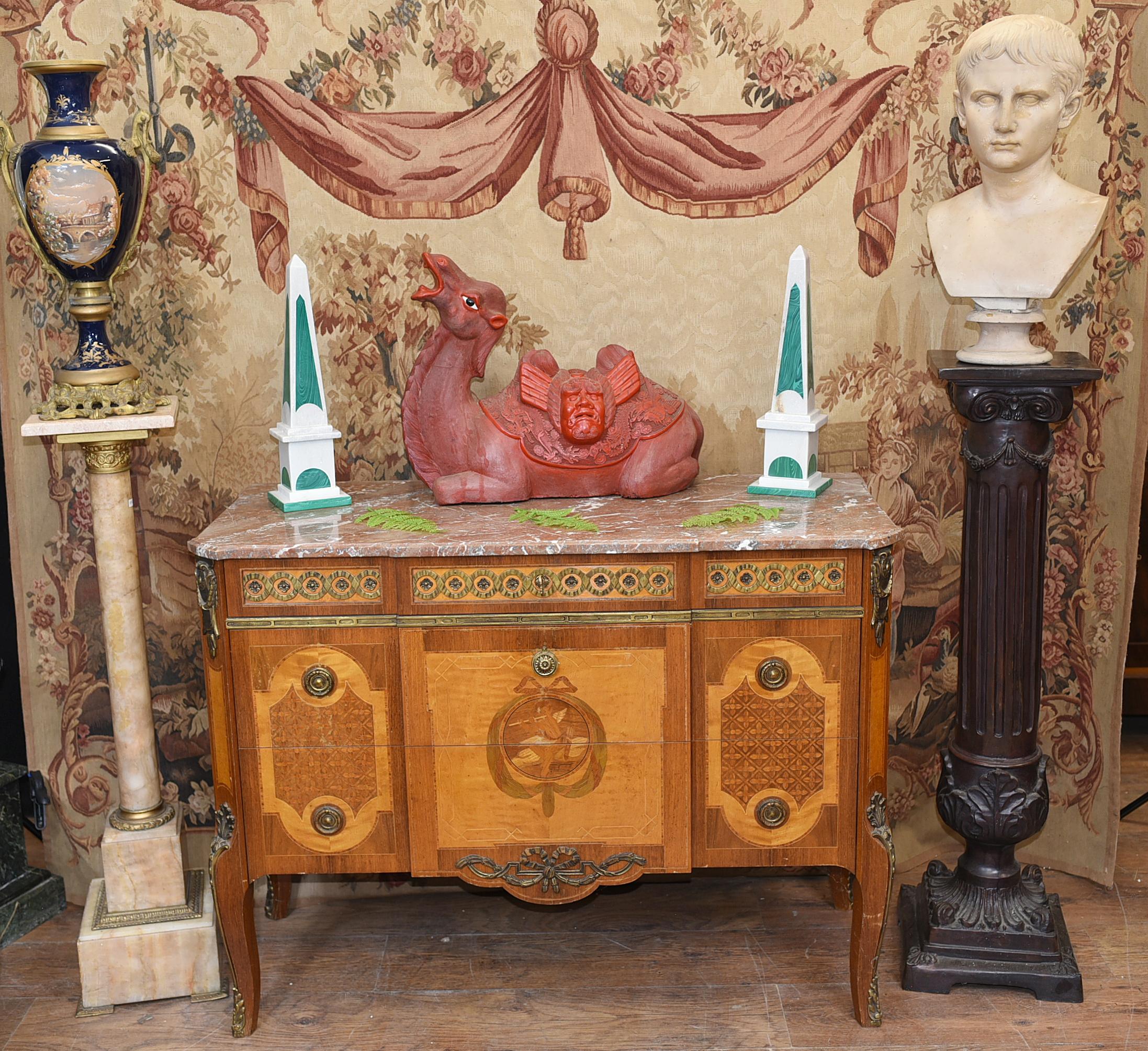 Wonderful Swedish commode we date to circa 1920
Such a good look to this cool piece, very interiors friendly
Ormolu fixtures also original and bright 
Inlay work very intricate showing cherubs and other motifs
Pink marble top is smooth and chip