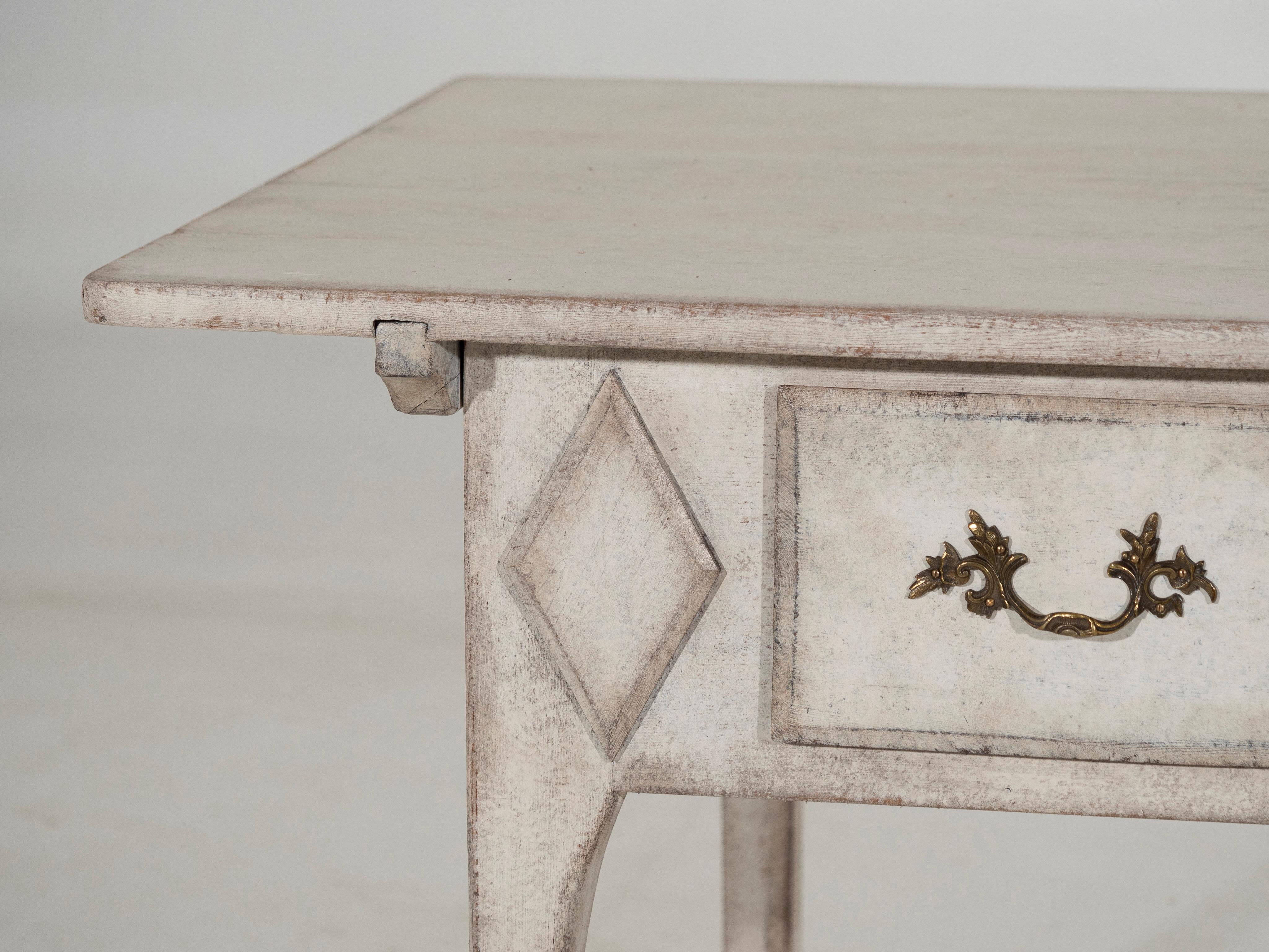 Charming freestadning Swedish console table with one drawer, richly carved, 19th Century.