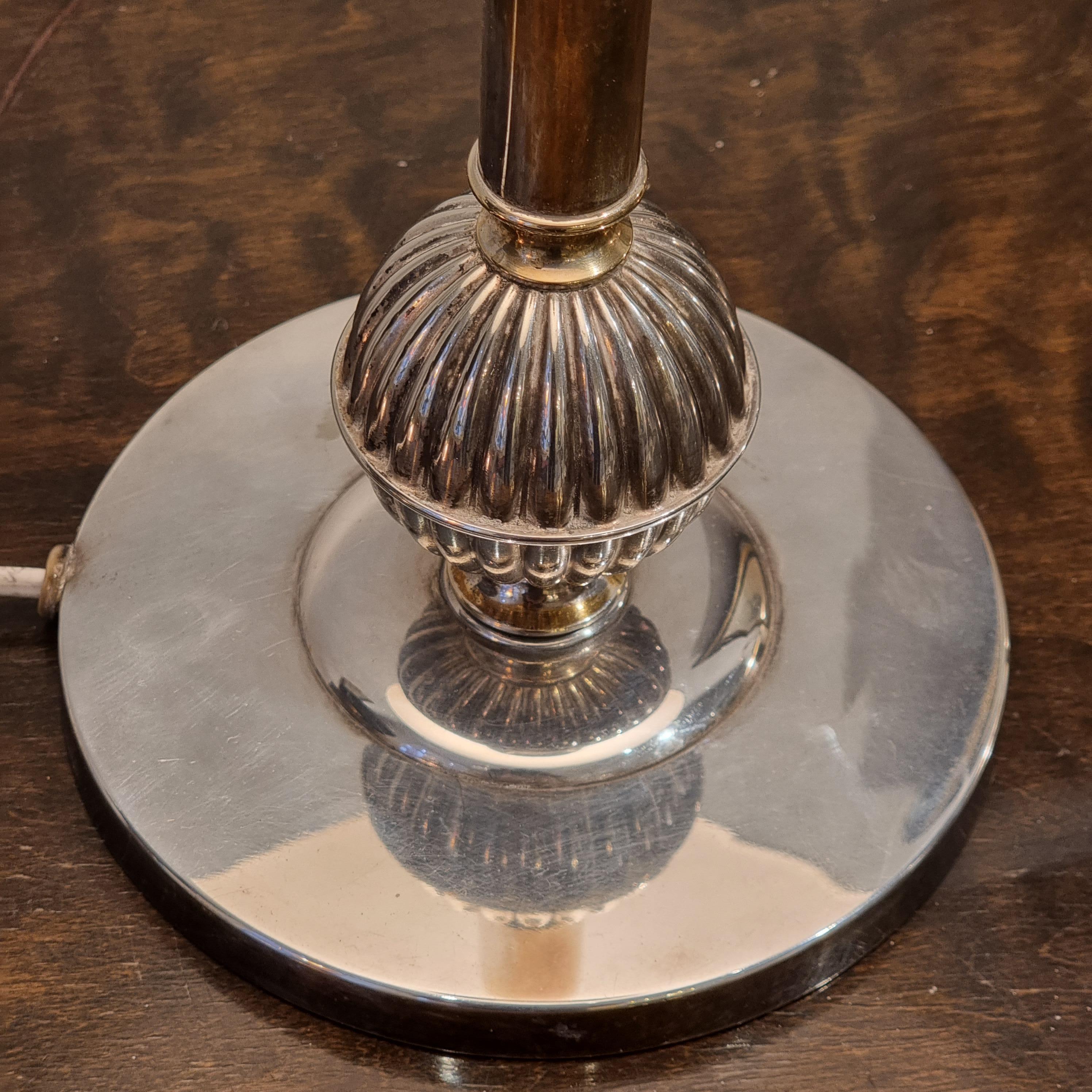 Beautiful example of Swedish grace beauty, a silver plate table lap with subtle elegance. Timeless design by Elis Bergh for court jeweler CG Hallberg, Sweden 1920/30s. Marked: CG Hallberg. 

Sold excl. shade.

Re-wired following swedish standard, we