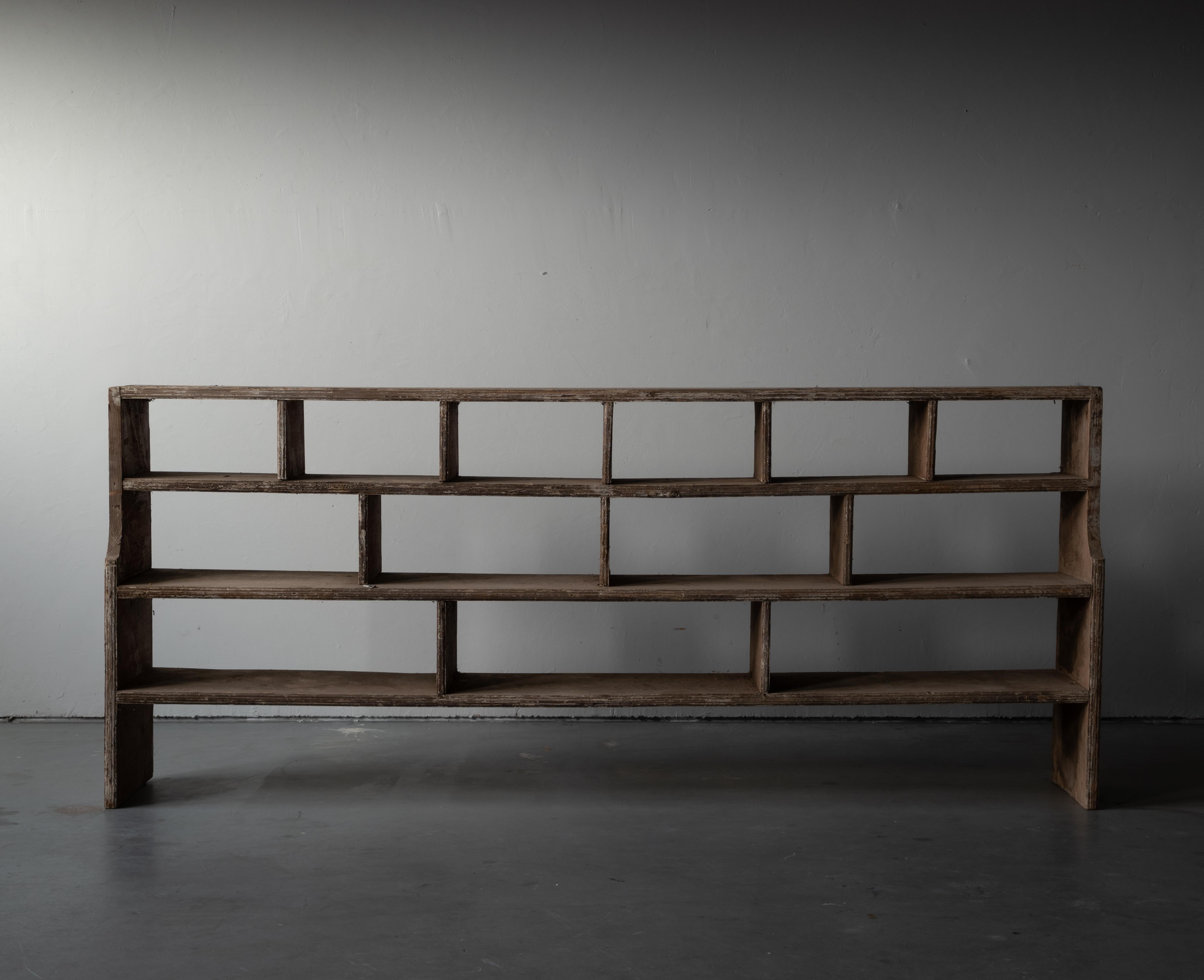 An antique shelf or bookcase / apothecary cabinet. Produced in Sweden 19th century. Likely originally placed atop another cabinet.