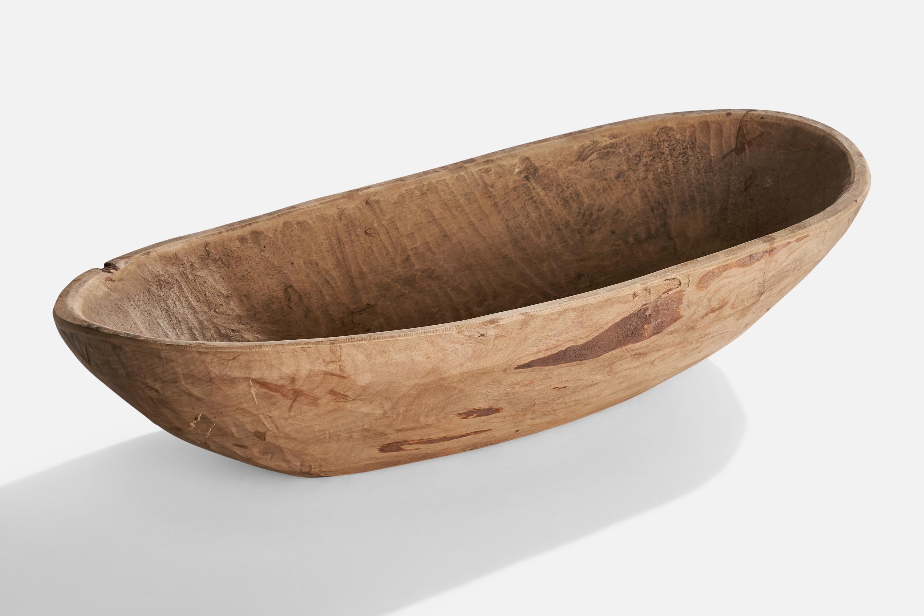 A wood bowl produced in Sweden, dated 1784.

Dimensions: 4.9” H x 22” W x 9.5” D