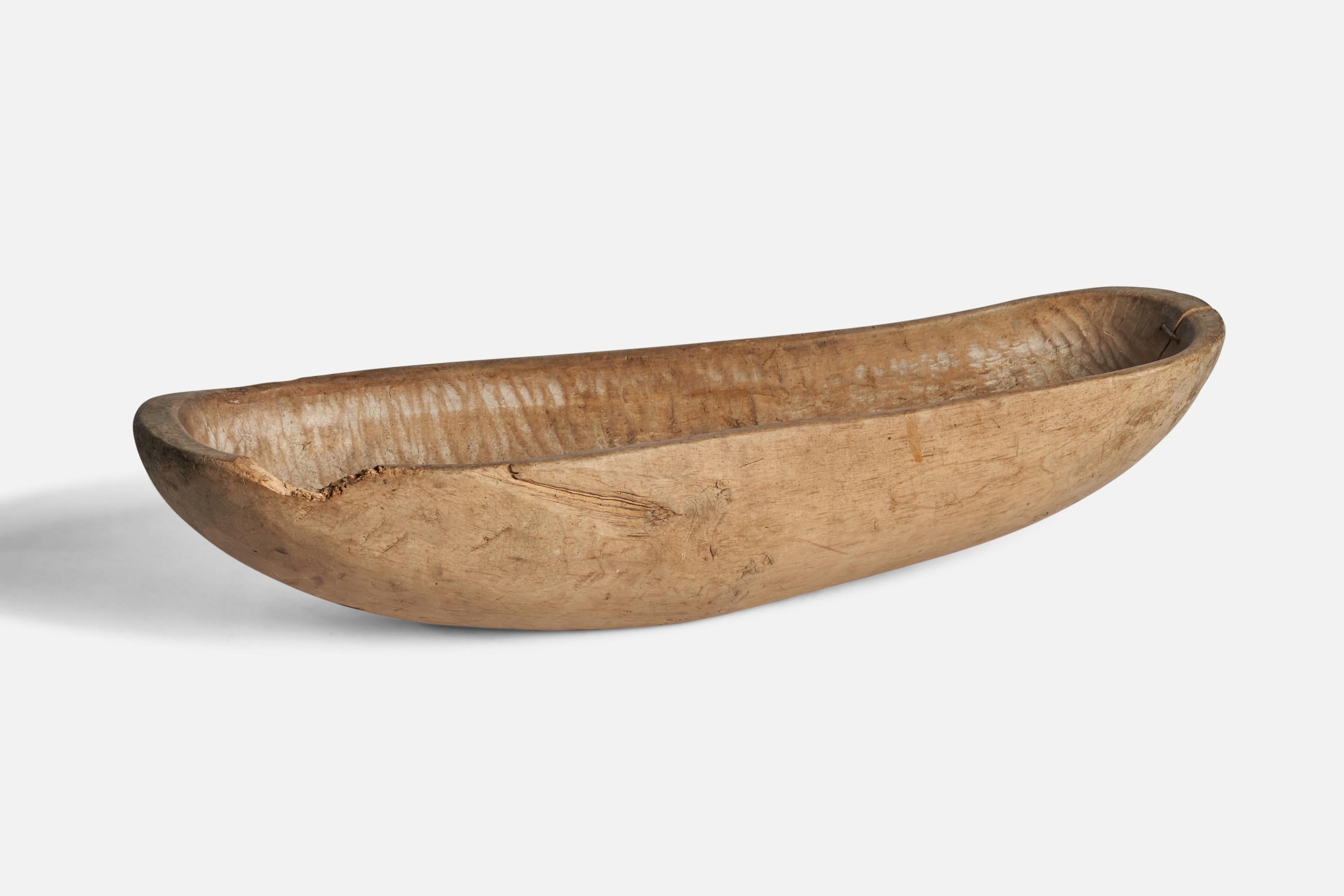 A wooden bowl produced in Sweden in 1814.

“M 1814” engraving on side