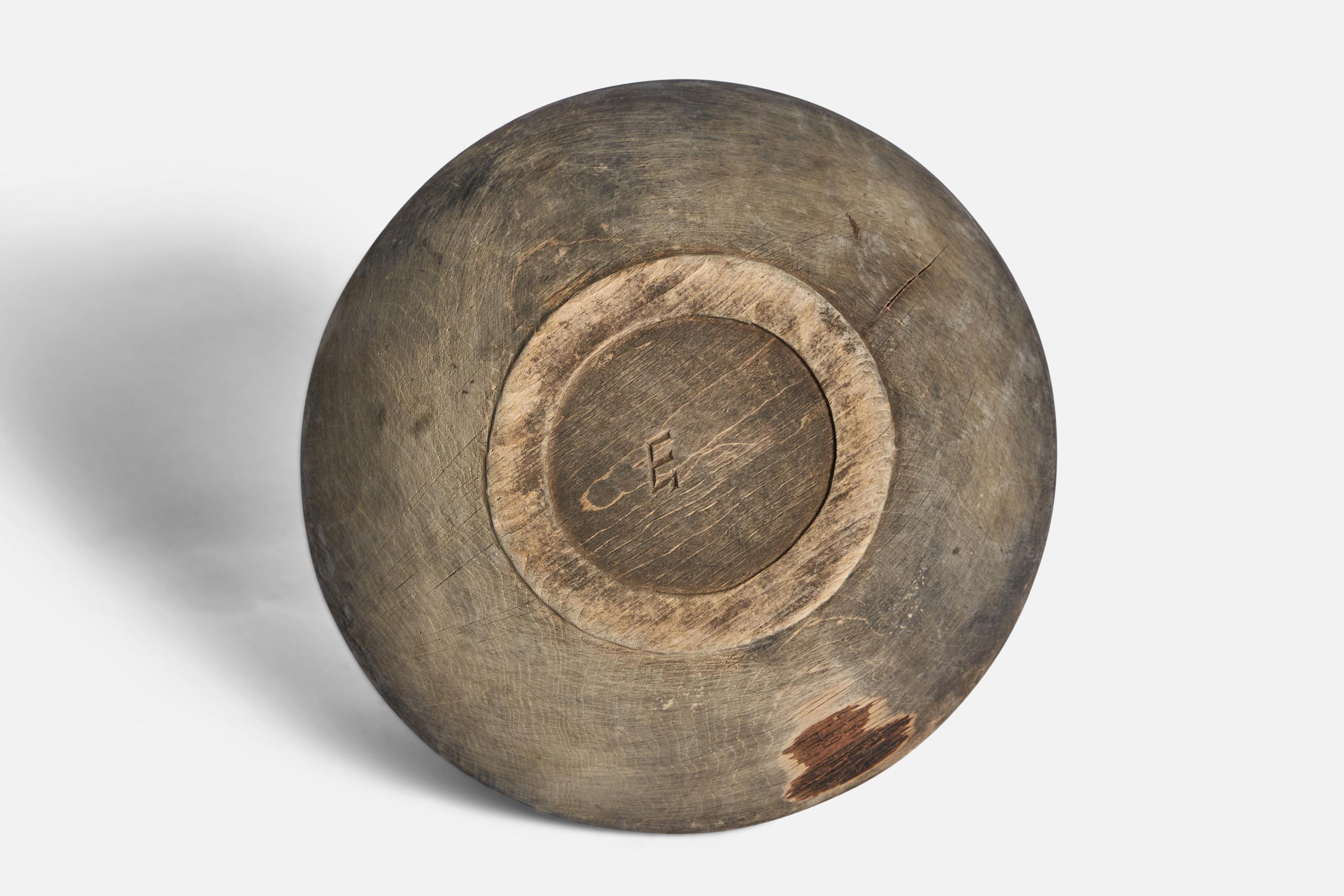 A wood bowl produced in Sweden, 19th century.

“E” symbol on bottom side