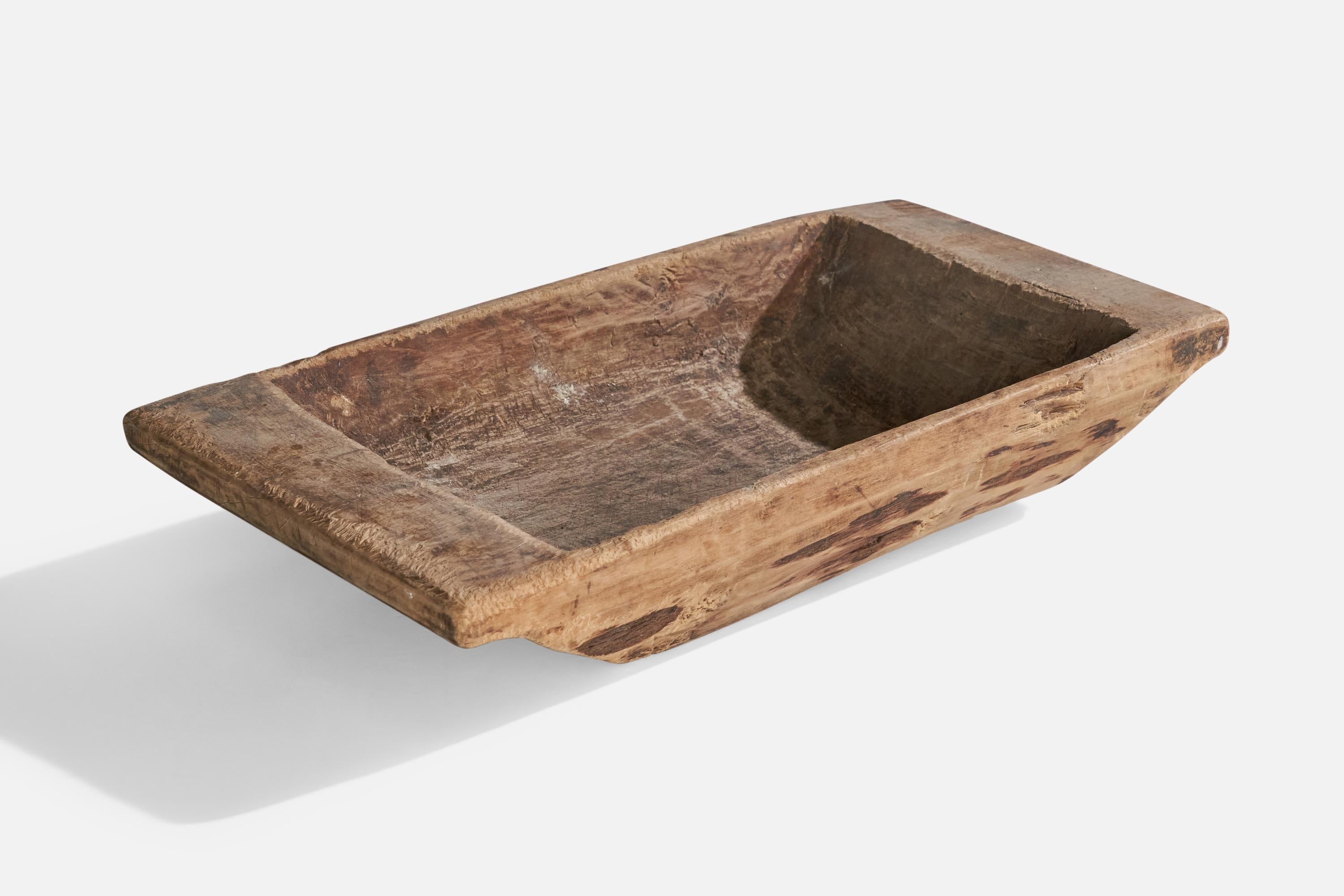 A wood bowl or trough produced in Sweden, 19th century.

Dimensions: 3.375” H x 18.25” W x 9.25” D