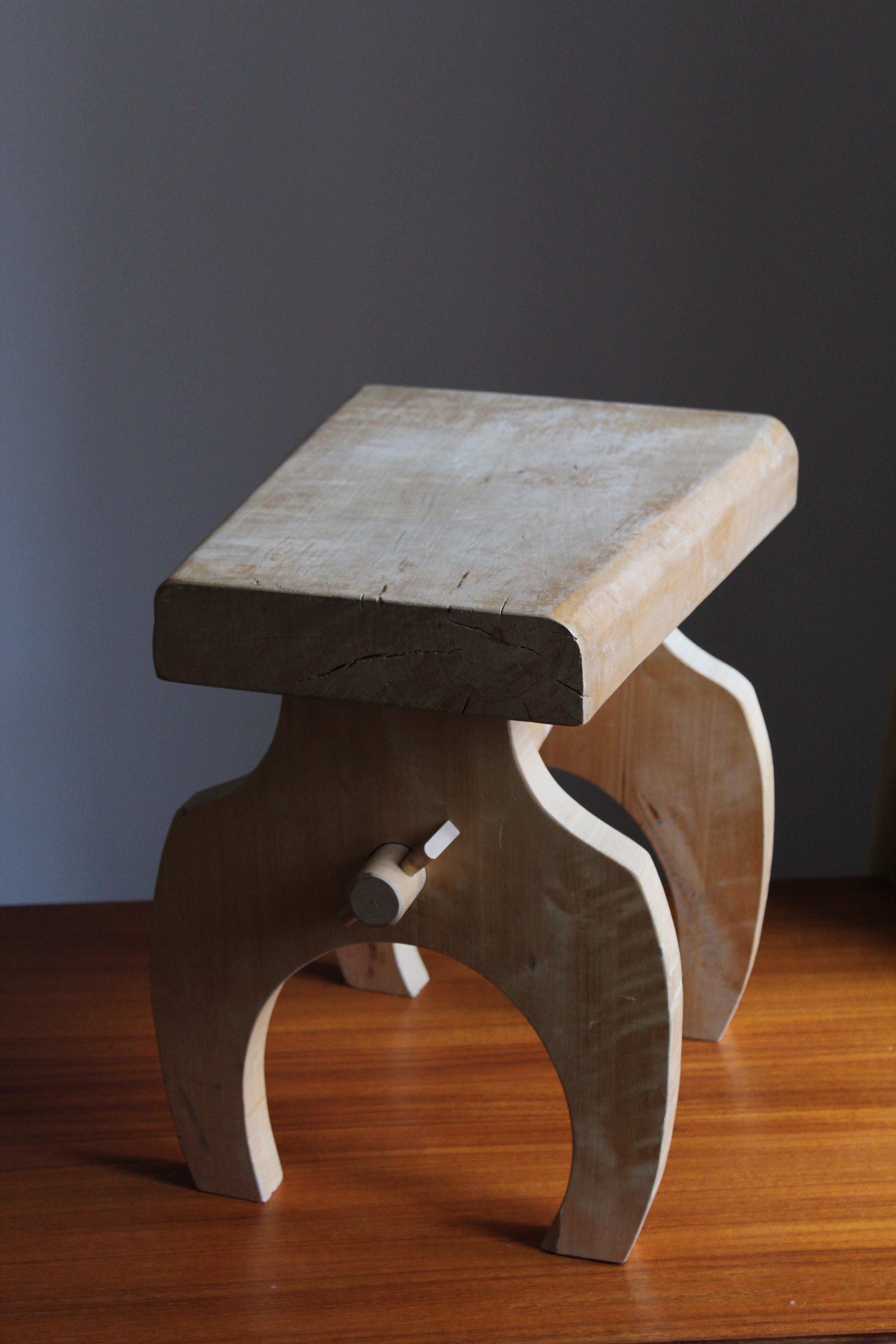 A stool or side table. Produced in Sweden by an unknown craftsman, circa 1980s

In light solid wood. 

Bears original label with artists manifesto translating roughly to 