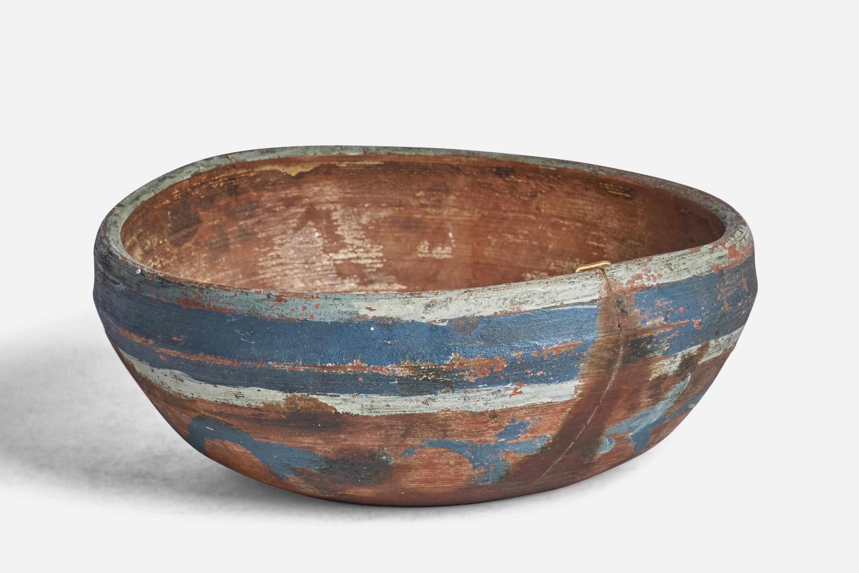 A small blue and white-painted wooden bowl designed and produced in Sweden, 19th century.