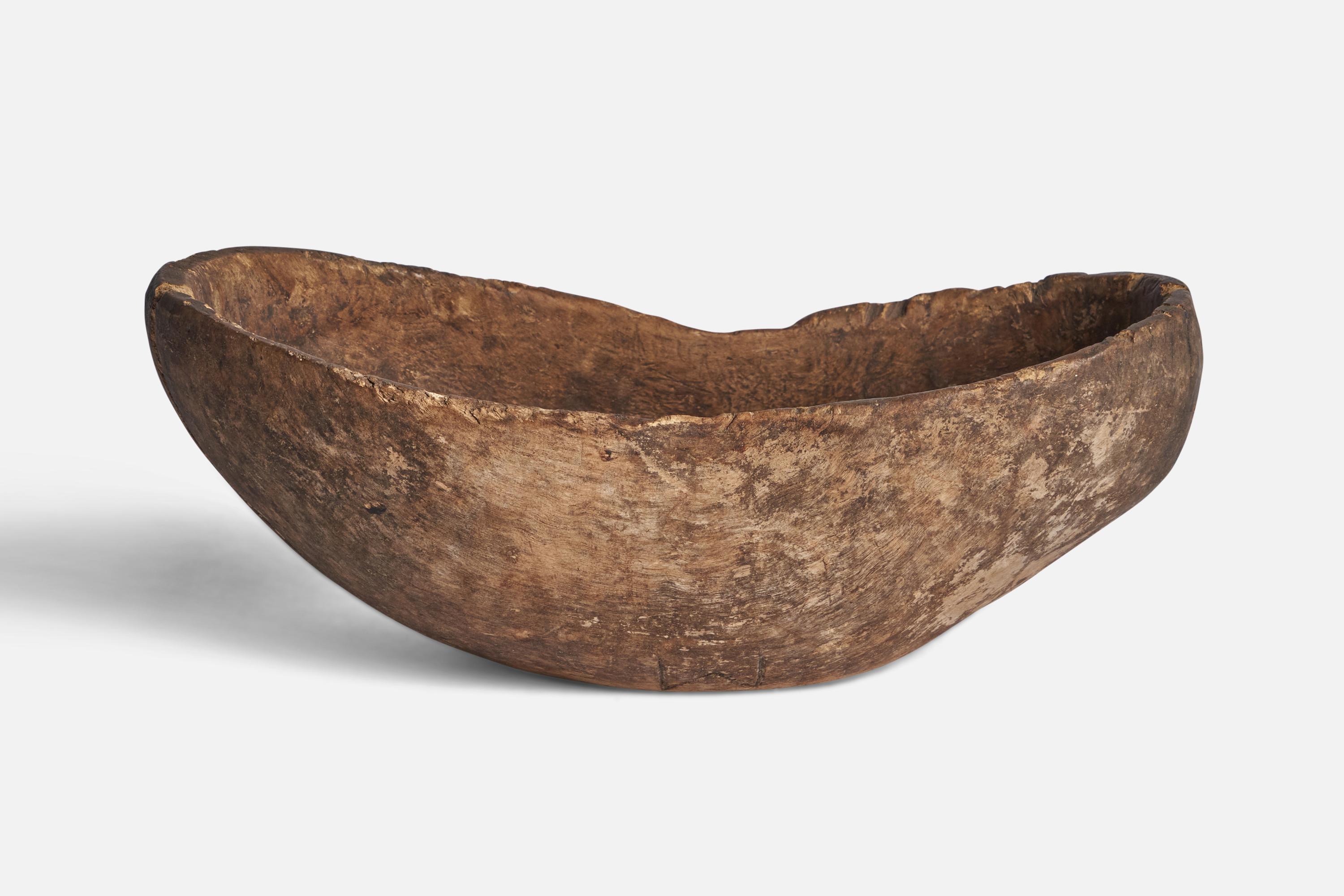 A wooden bowl designed and produced in Sweden in 1668.

“1668” inscription on bottom